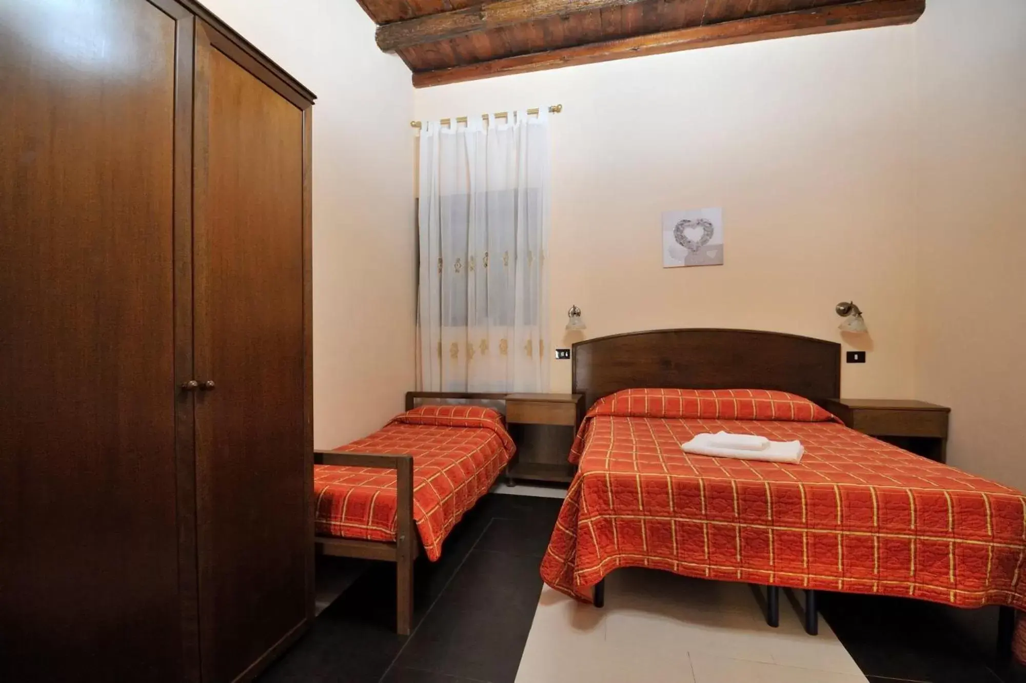 Bed in Hotel Piccolo