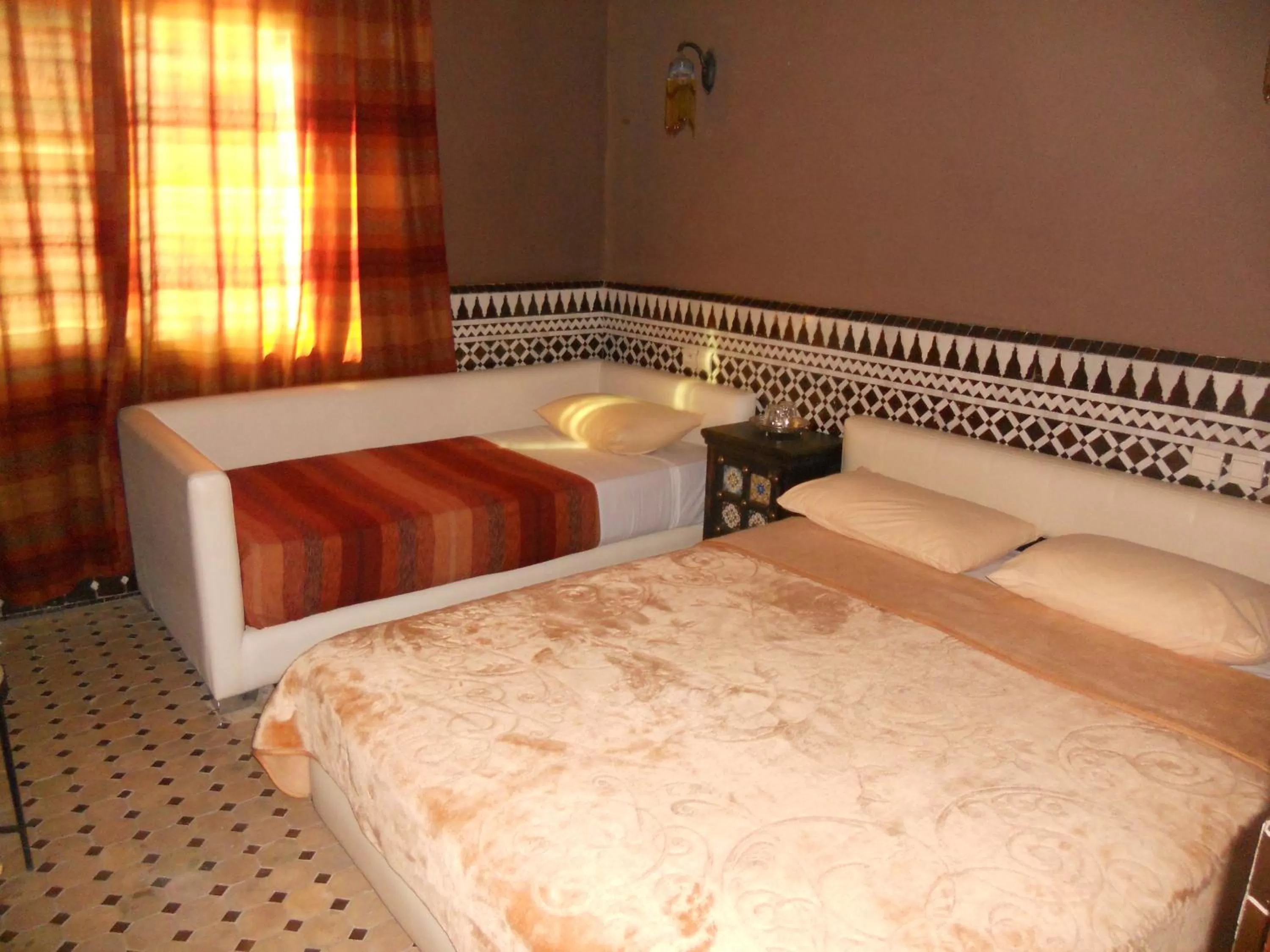 Bed in Riad Passiflora
