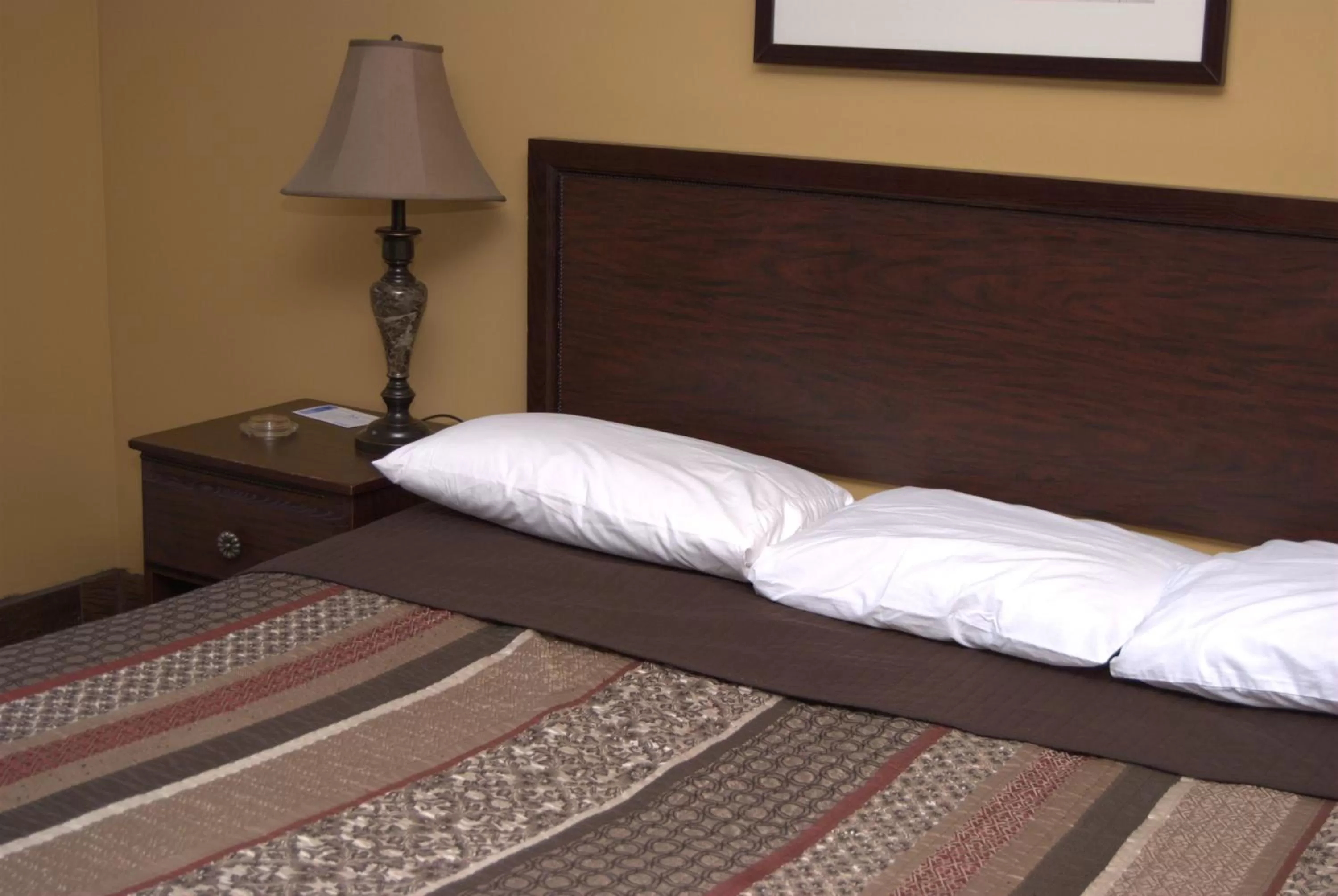 Bed, Room Photo in Commodore Resort