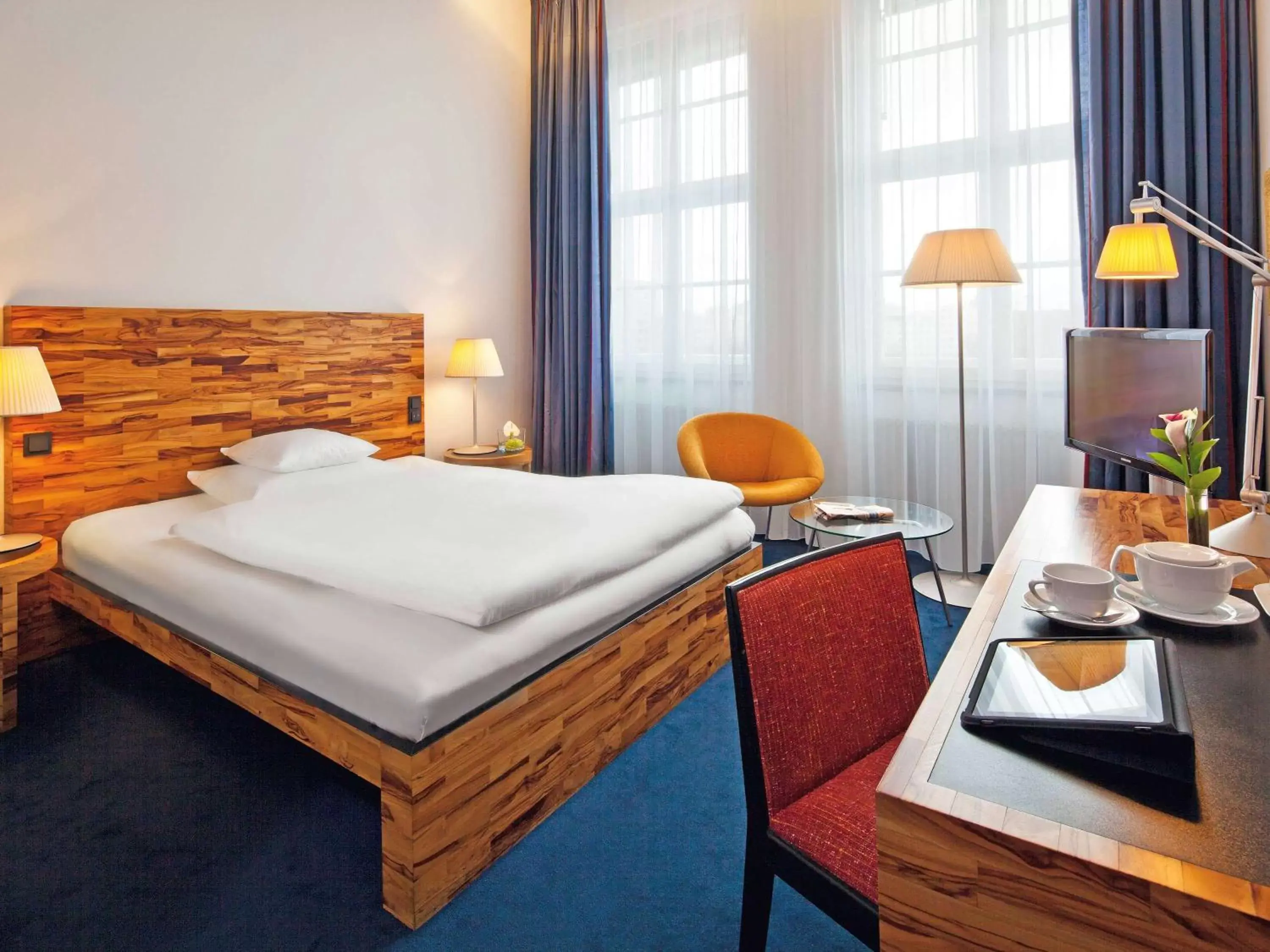 Photo of the whole room, Bed in Mövenpick Hotel Berlin Am Potsdamer Platz