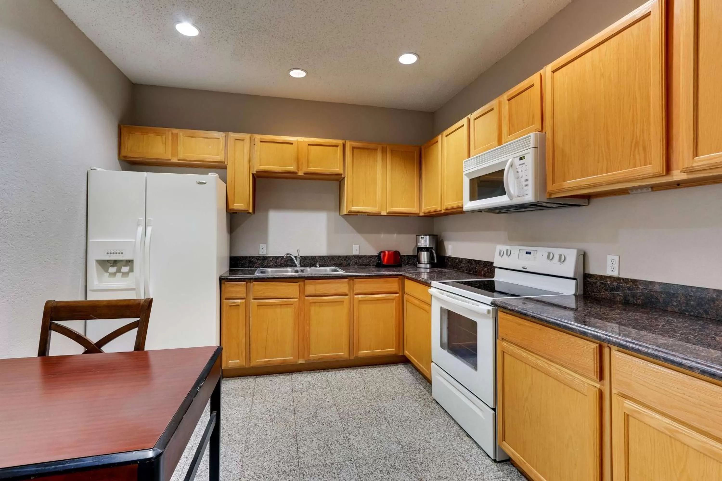 Bedroom in Best Western Plus University Inn & Suites