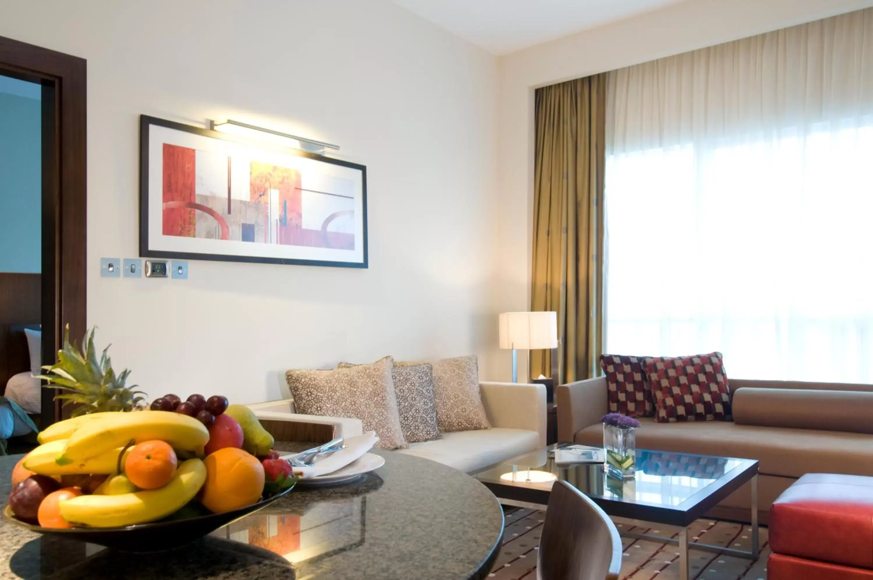 Living room, Seating Area in Grand Millennium Al Wahda Hotel and Executive Apartments Abu Dhabi