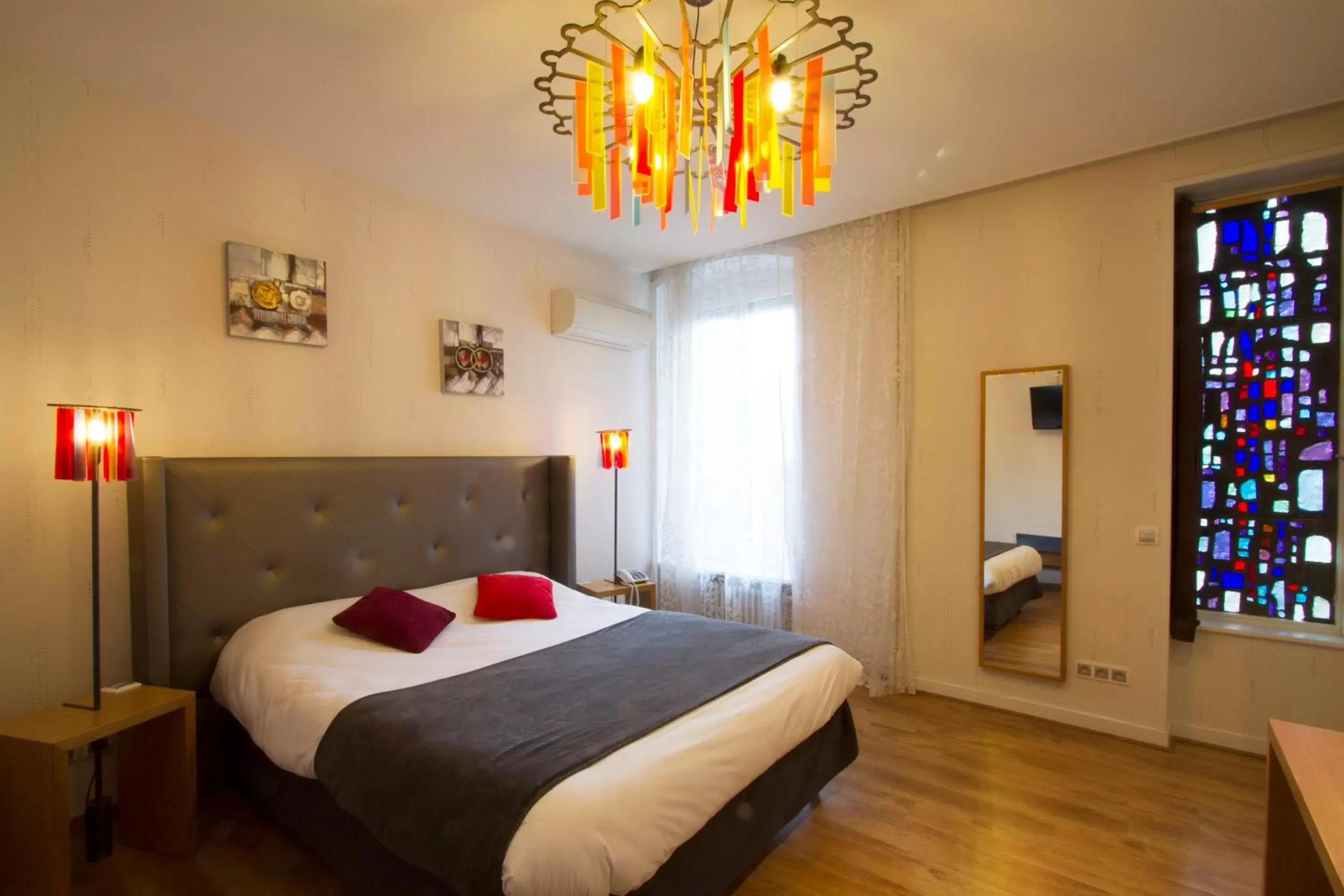 Bedroom, Bed in Brit Hotel Roanne - Le Grand Hôtel