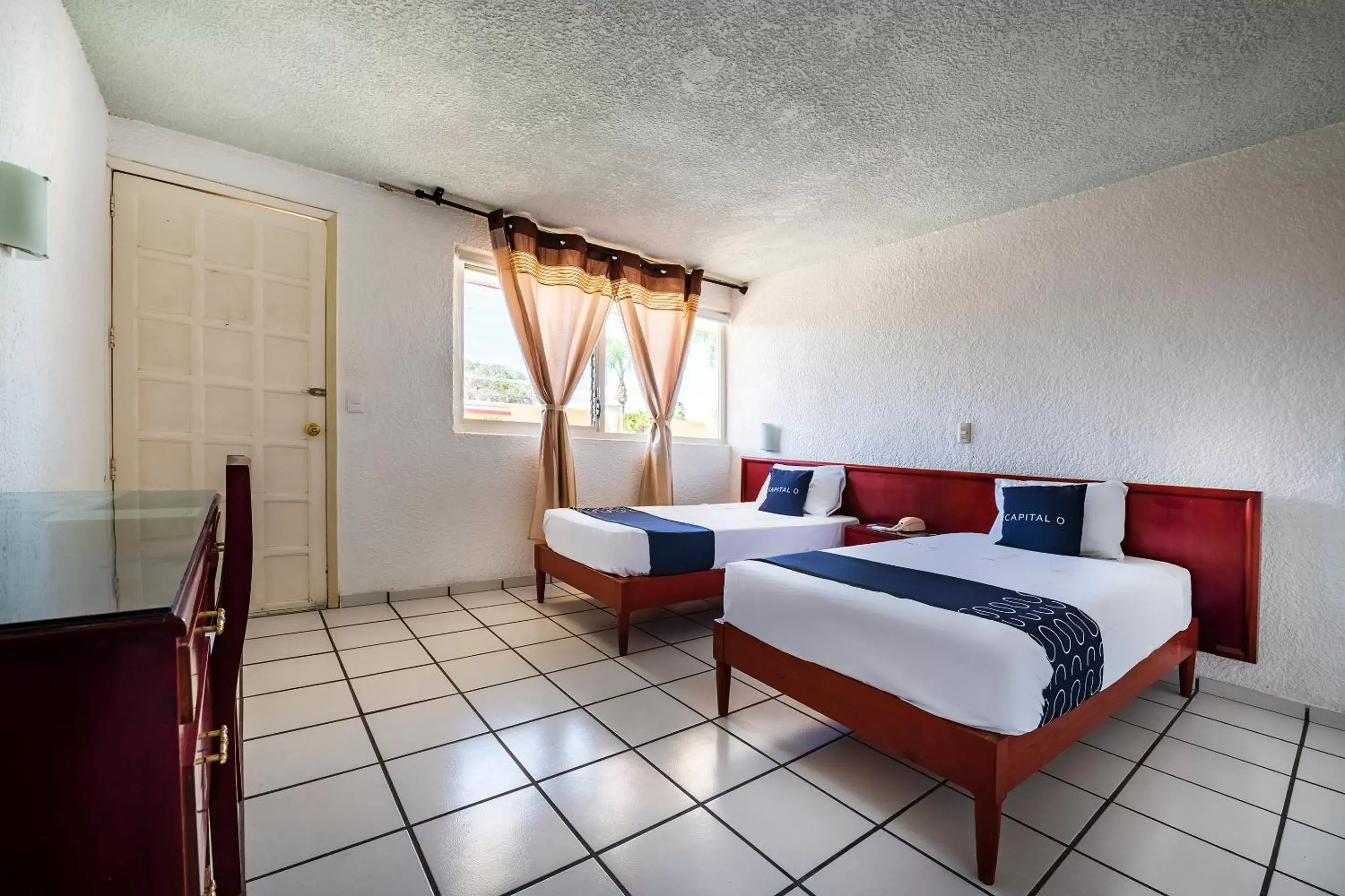 Bedroom, Seating Area in Capital O Colón, Ciudad Guzmán Jalisco