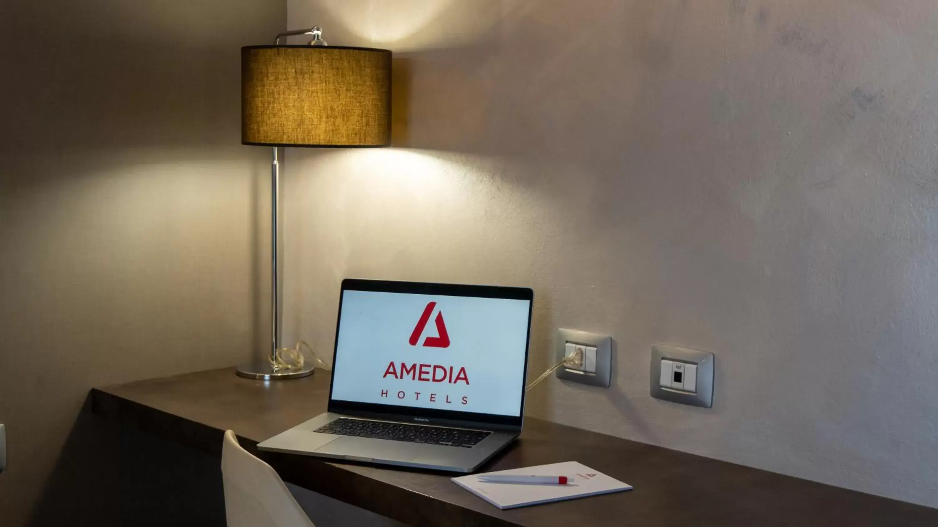 Seating area, TV/Entertainment Center in AMEDIA Hotel