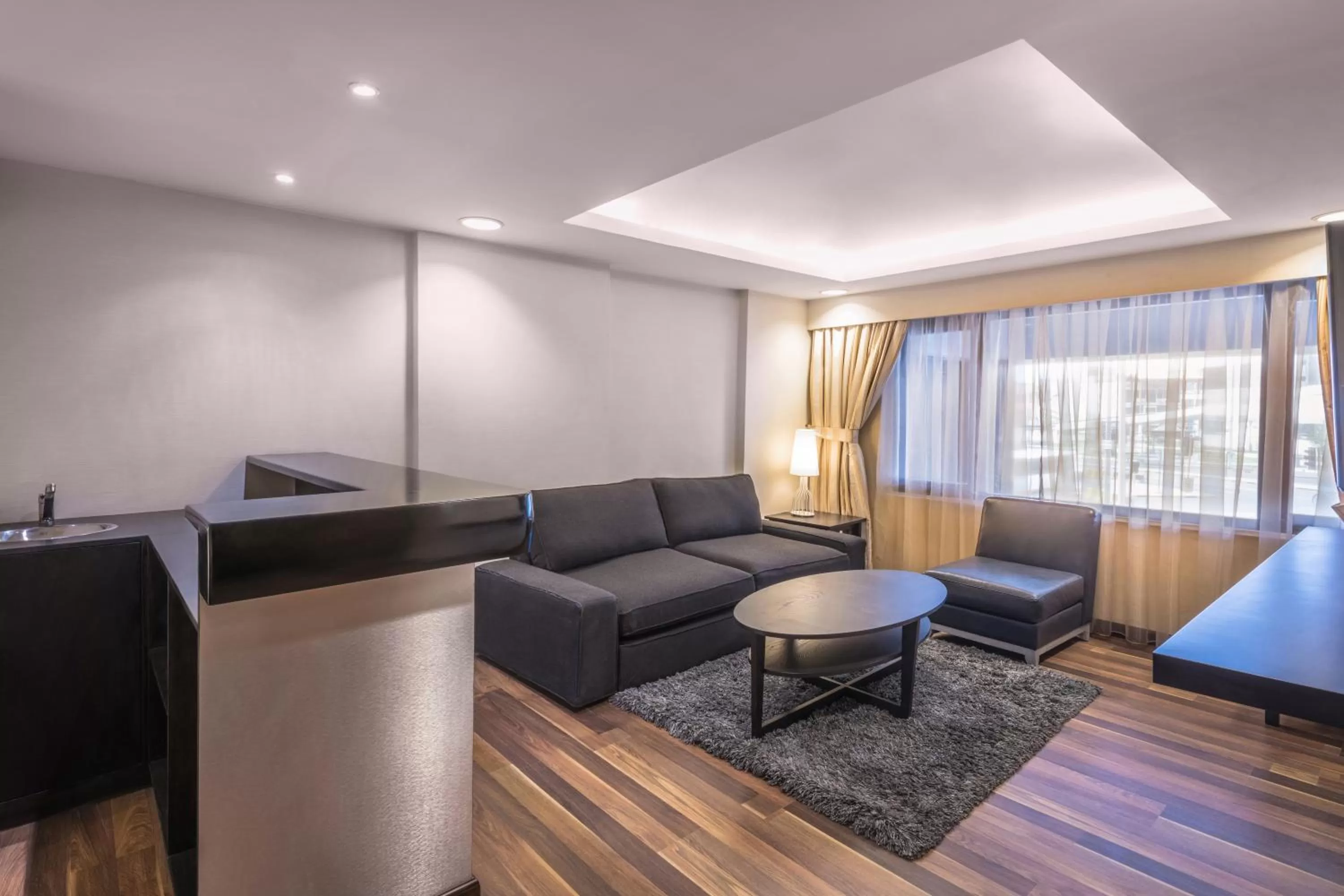 Living room in Oasis Hotel