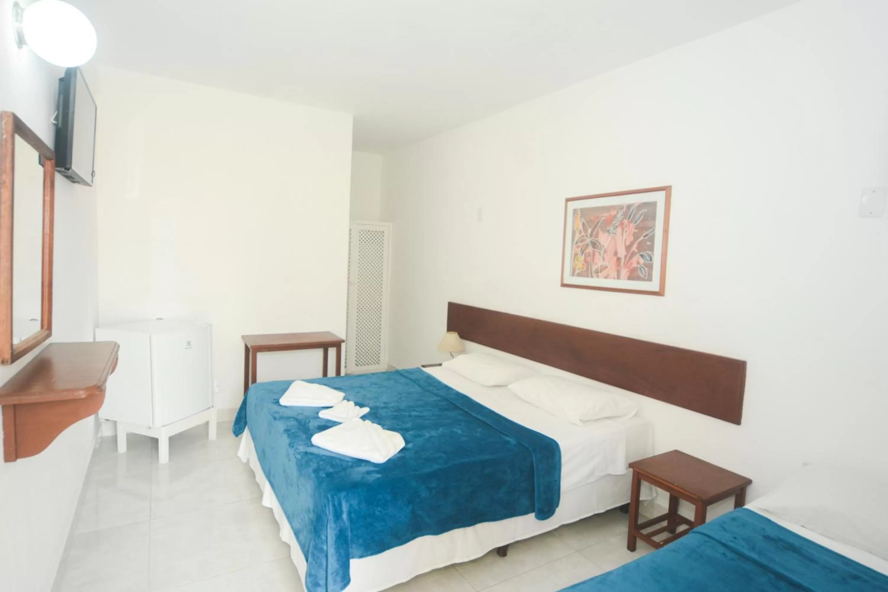 Bed in Pousada Estrela de Paraty