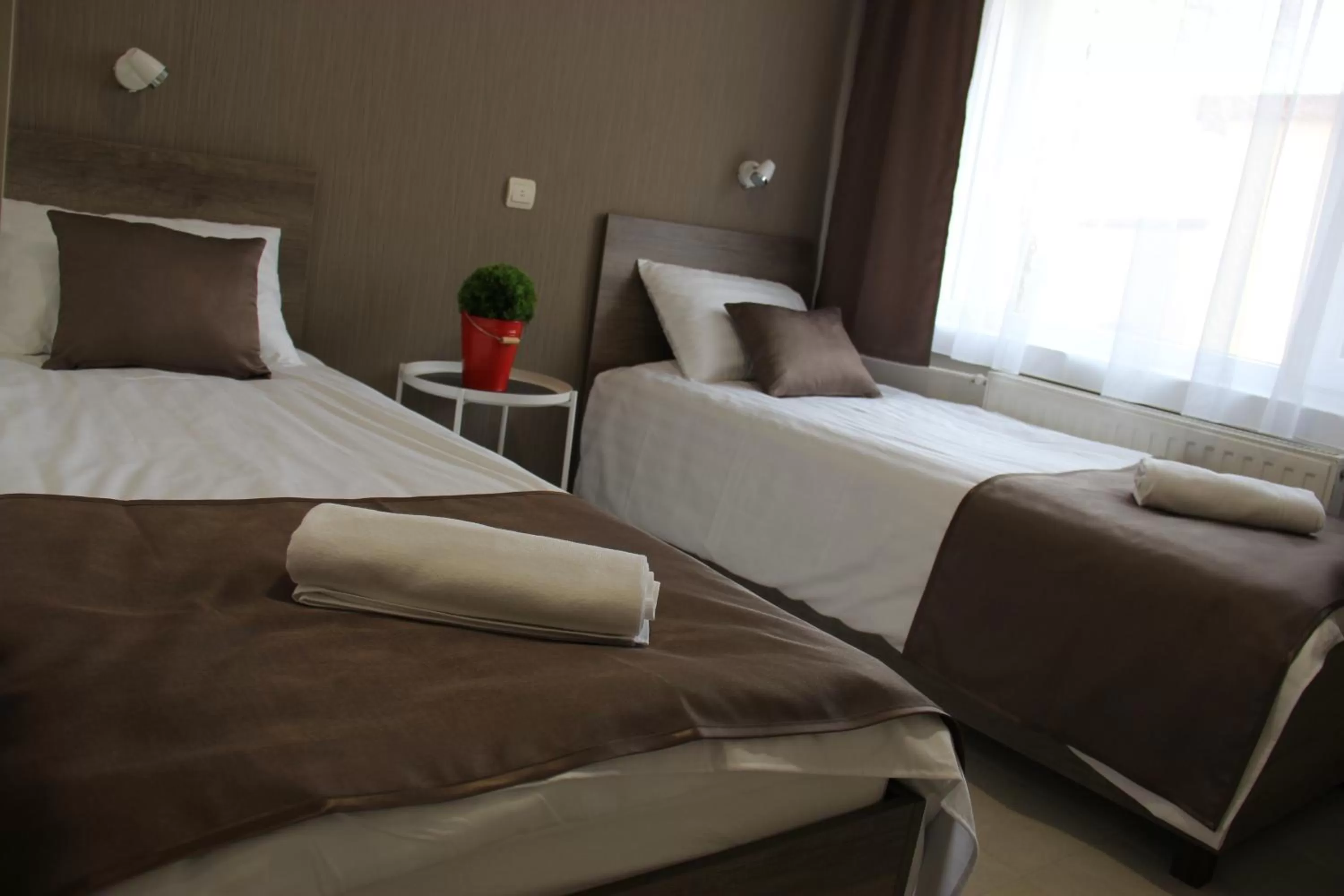 Bed in Familia Panzió & Apartmanház Győr