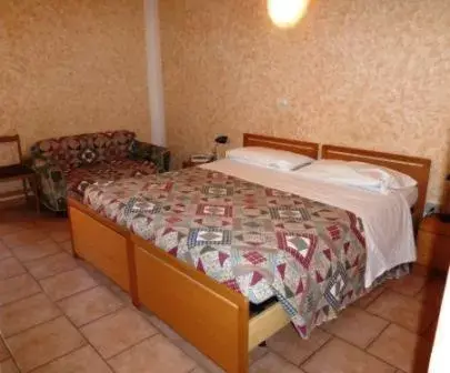 Bed in Hotel Bolognese