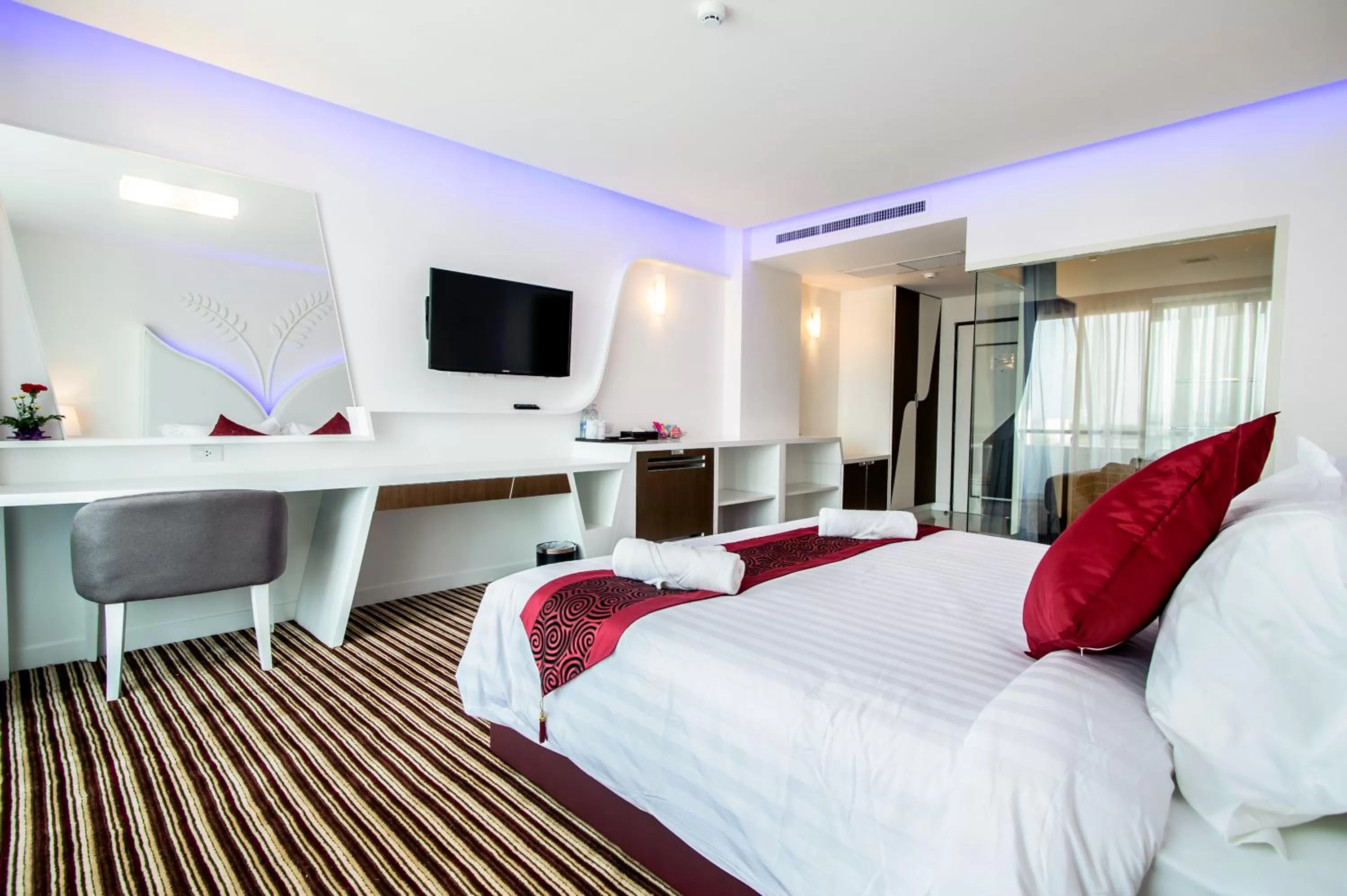 Bed in The Paradiso JK Design Hotel