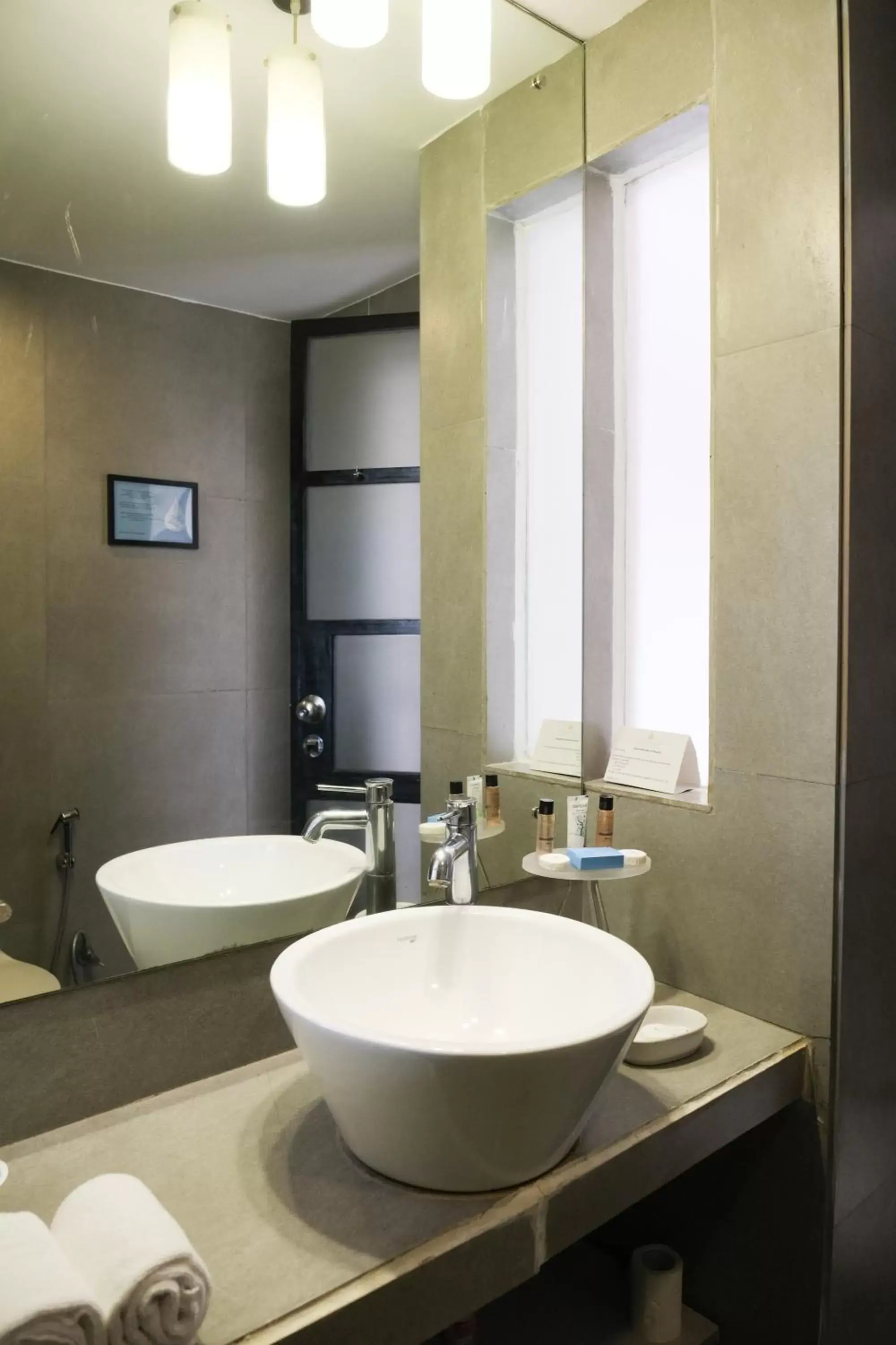 Bathroom in Whispering Palms Beach Resort