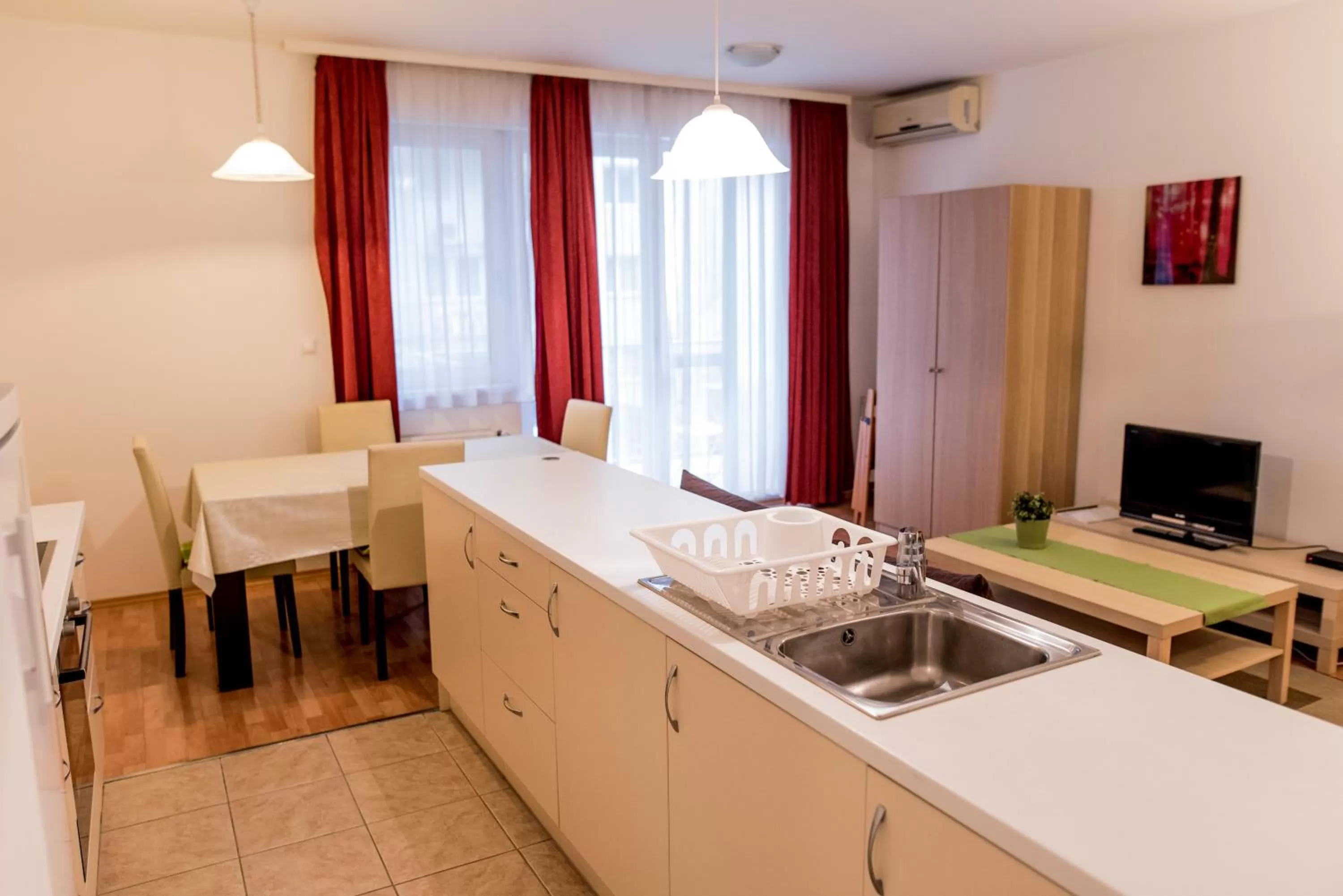 Kitchen or kitchenette in Agape Apartments