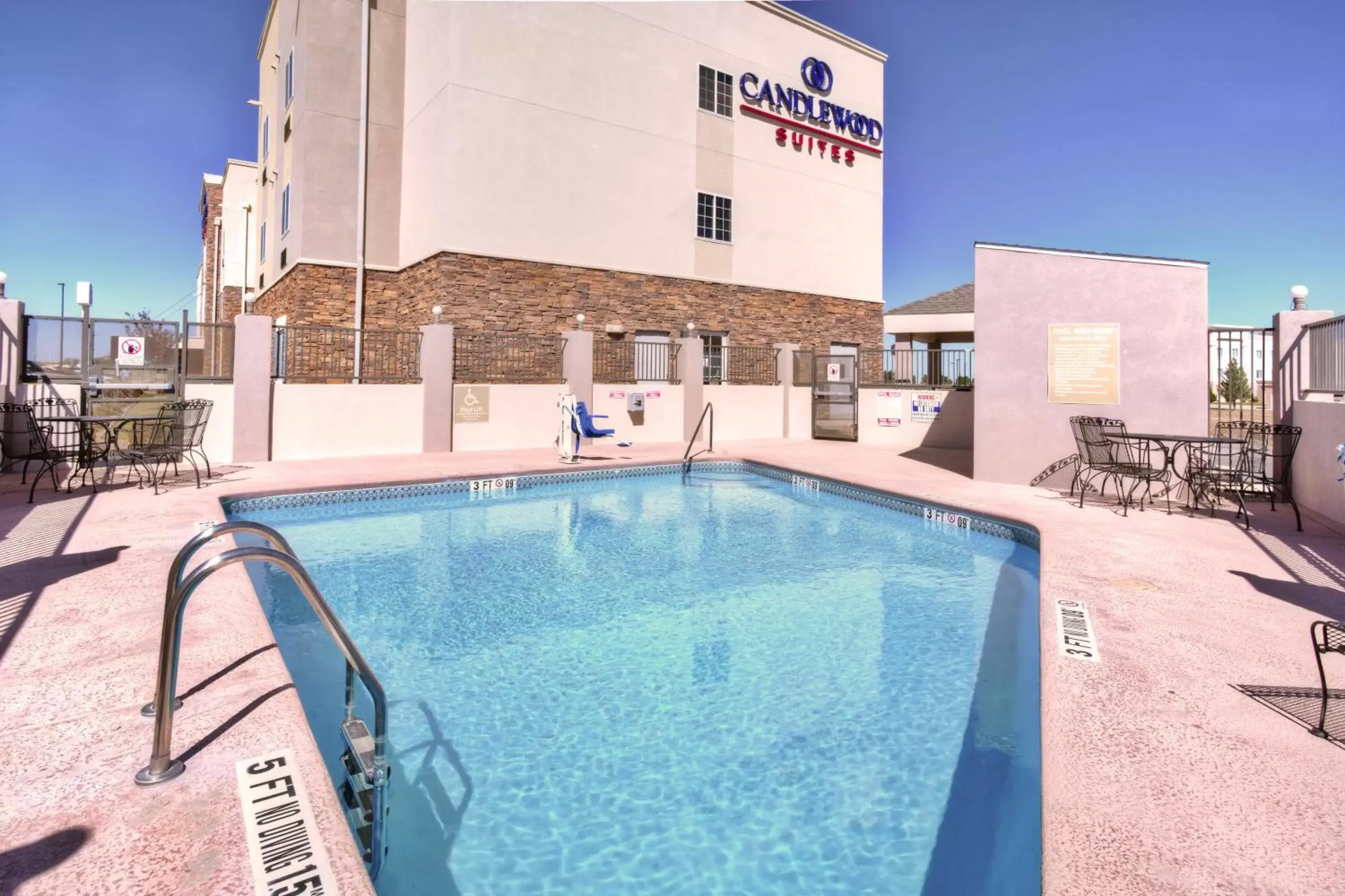 Swimming pool, Property Building in Candlewood Suites Fort Stockton, an IHG Hotel