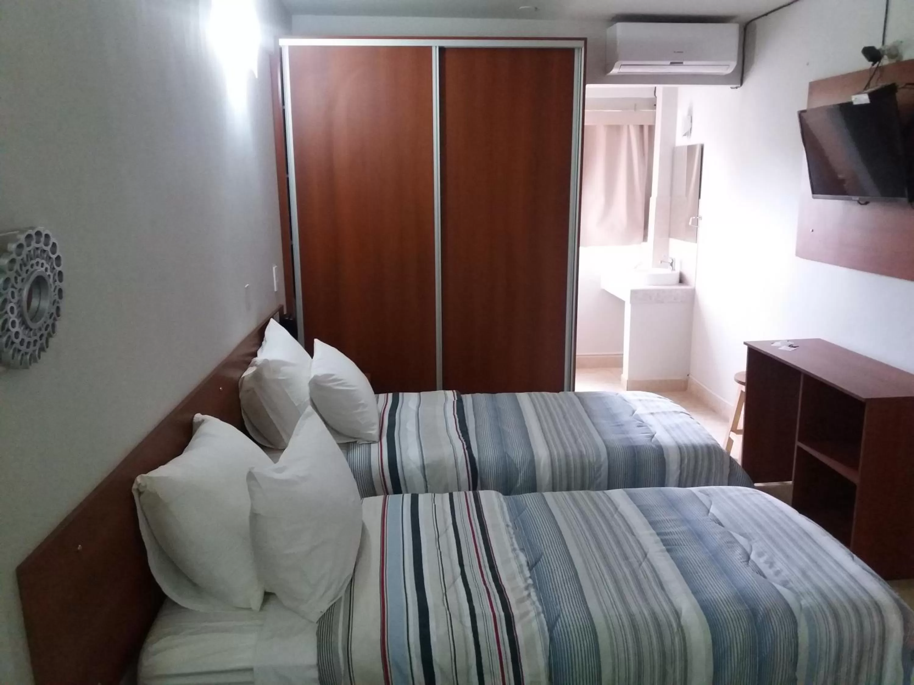 Bed in Madame Lynch Hotel Asuncion