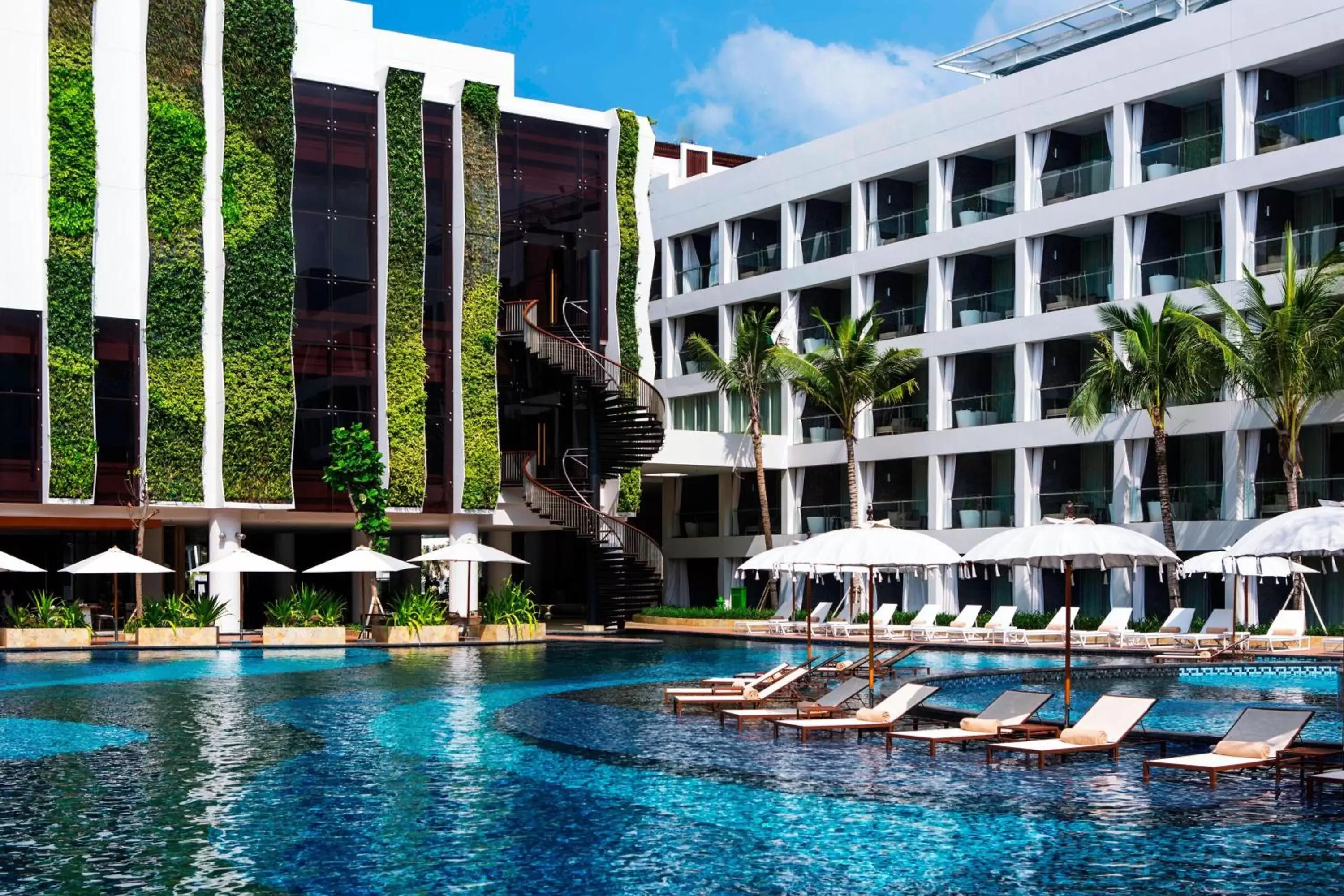 Swimming pool, Property Building in The Stones - Legian, Bali - A Marriott Autograph Collection Hotel