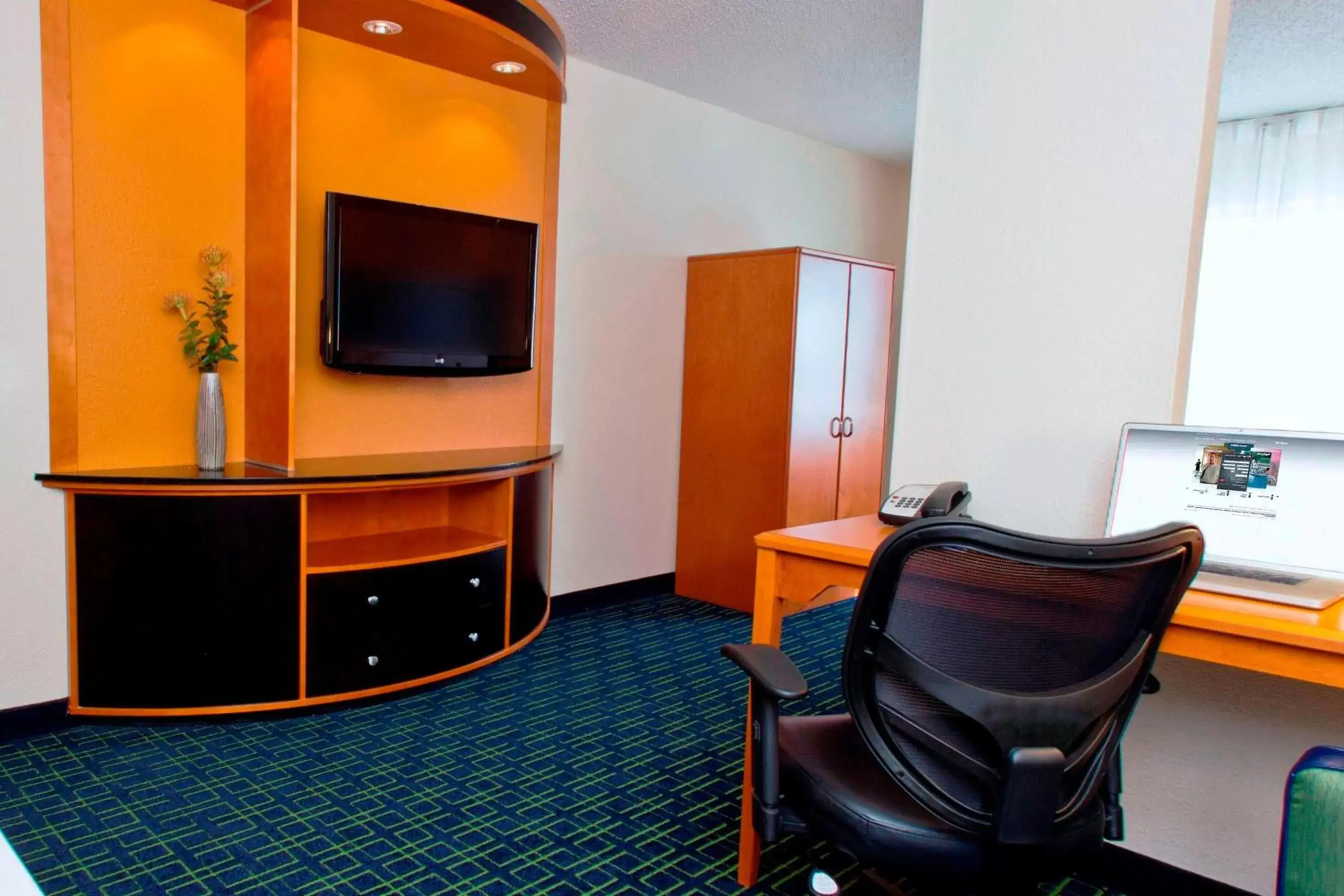 Photo of the whole room, TV/Entertainment Center in Fairfield Inn & Suites Joliet North/Plainfield