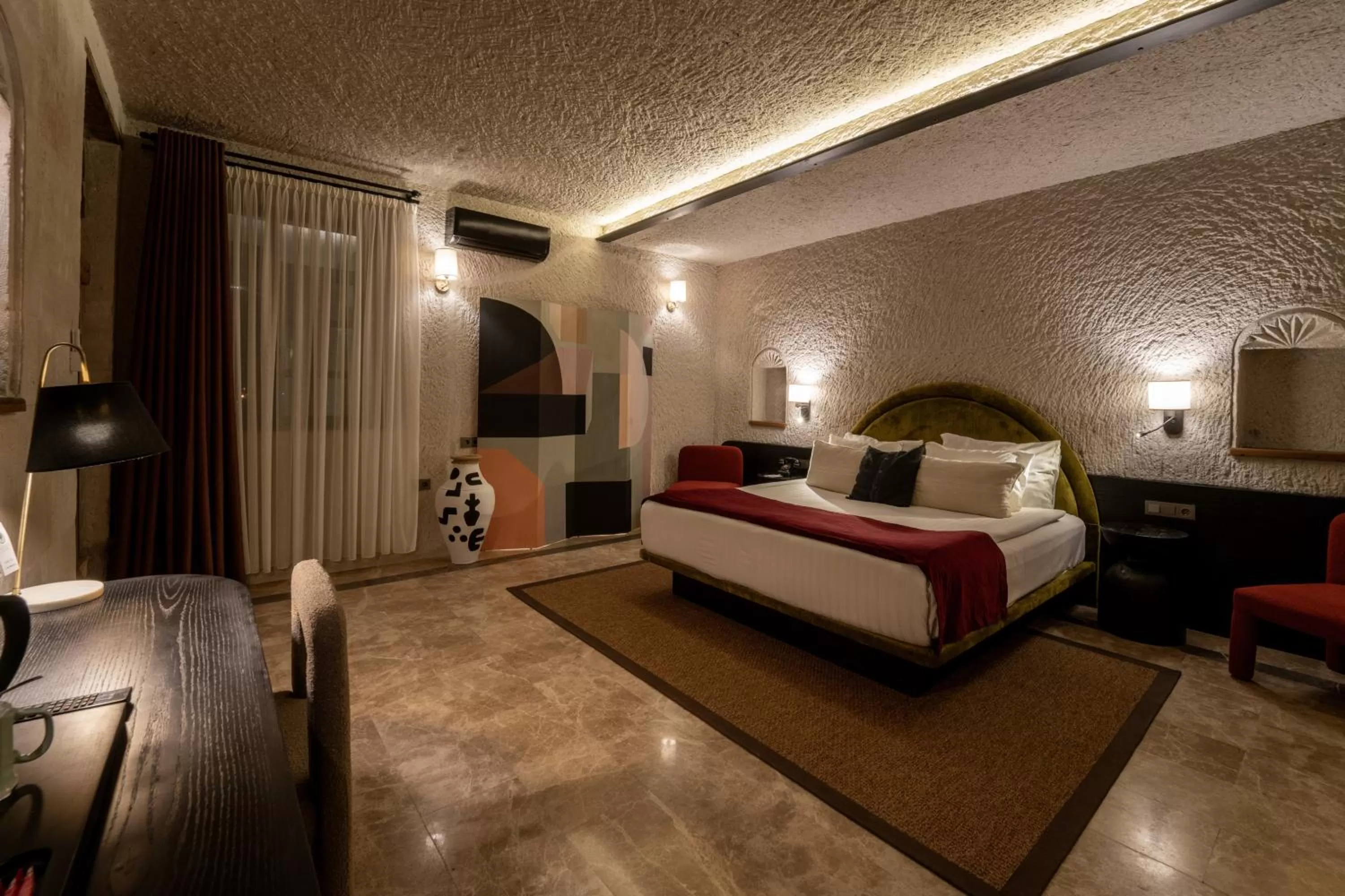 Bedroom, Bed in Artemis Cave Suites & Spa- Adults Only