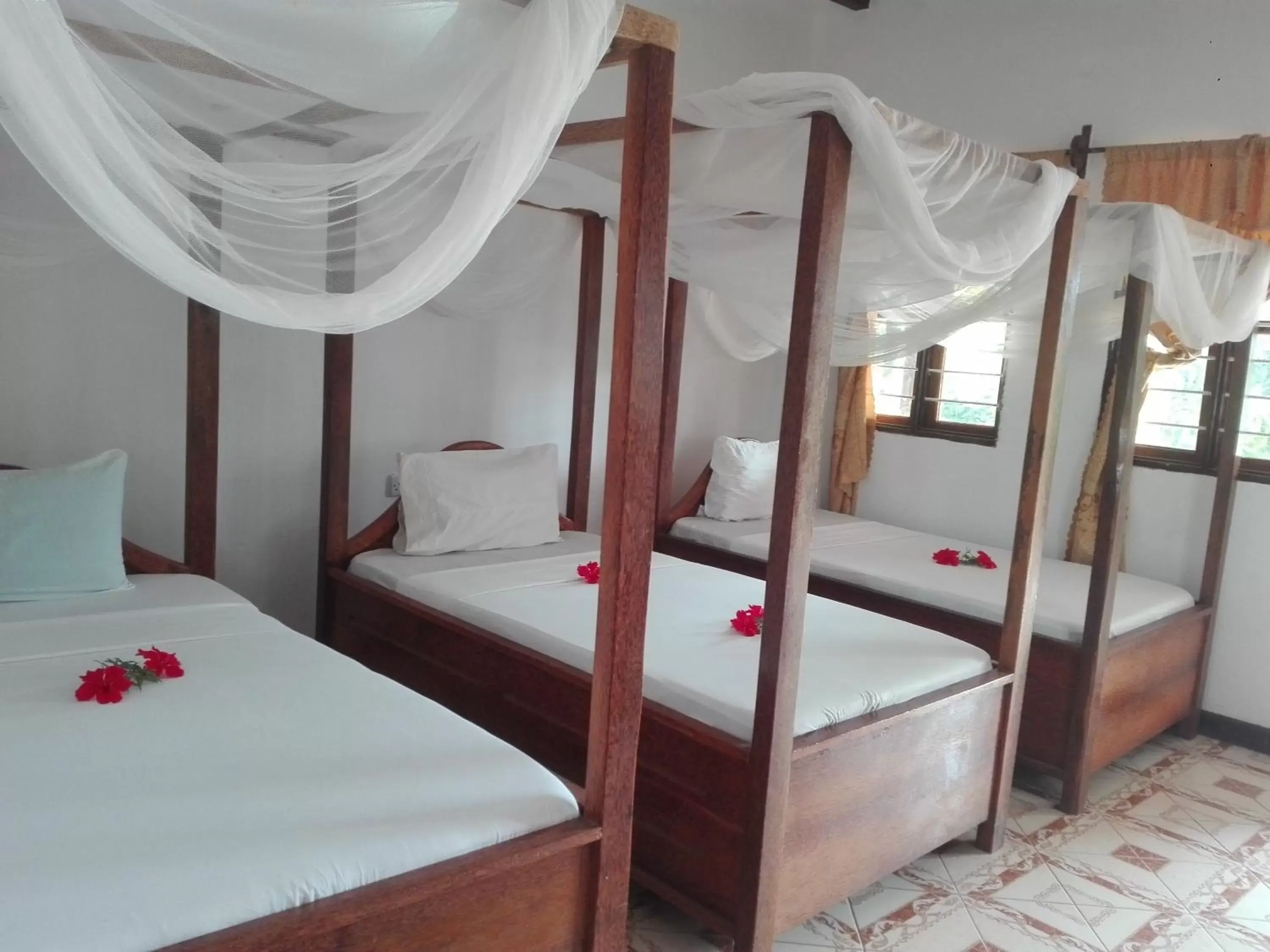 Triple Room with Private Bathroom in Ames Nungwi Triple Room with Private Bathroom in Ames Nungwi