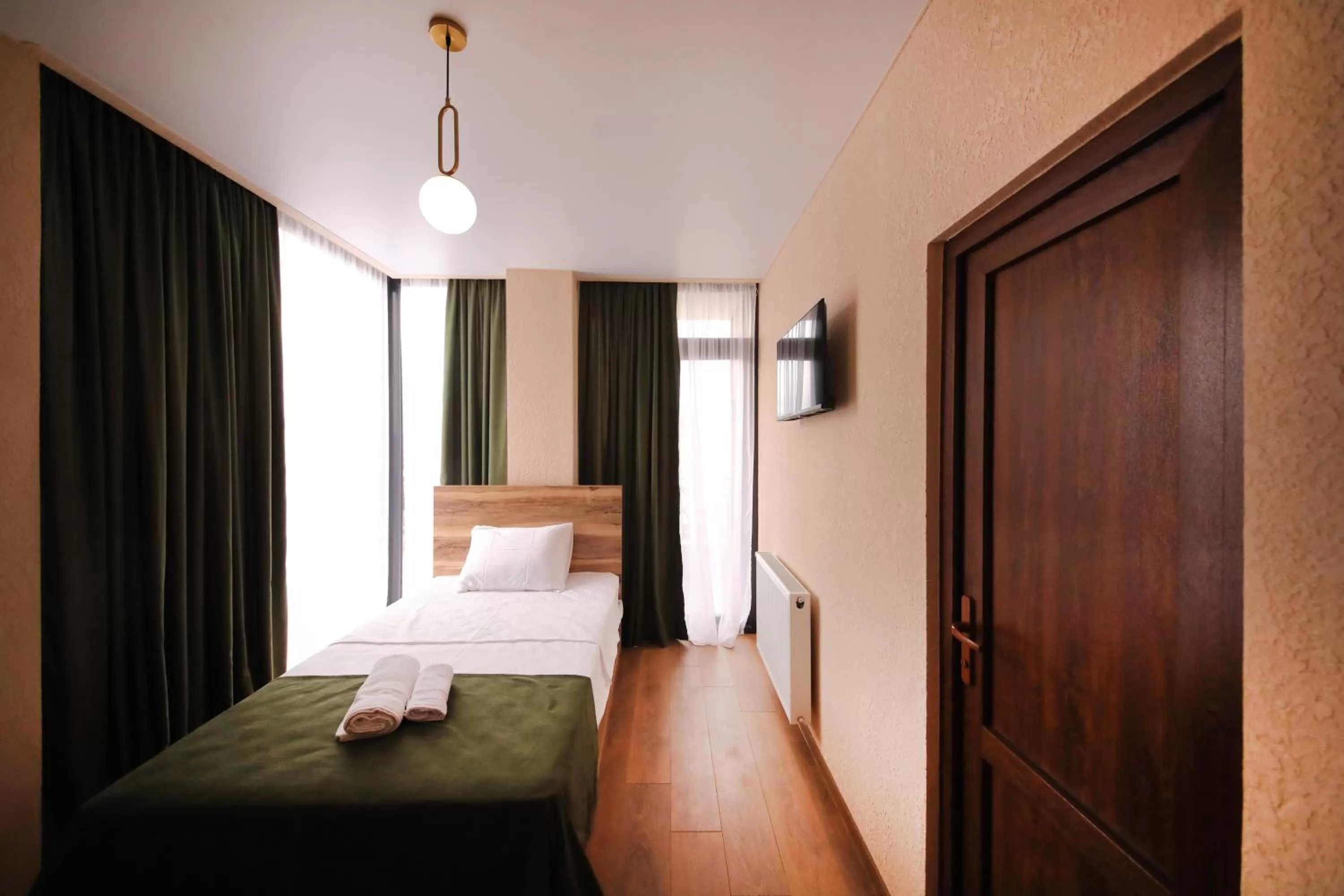 Bed in Bessarion Boutique Hotel