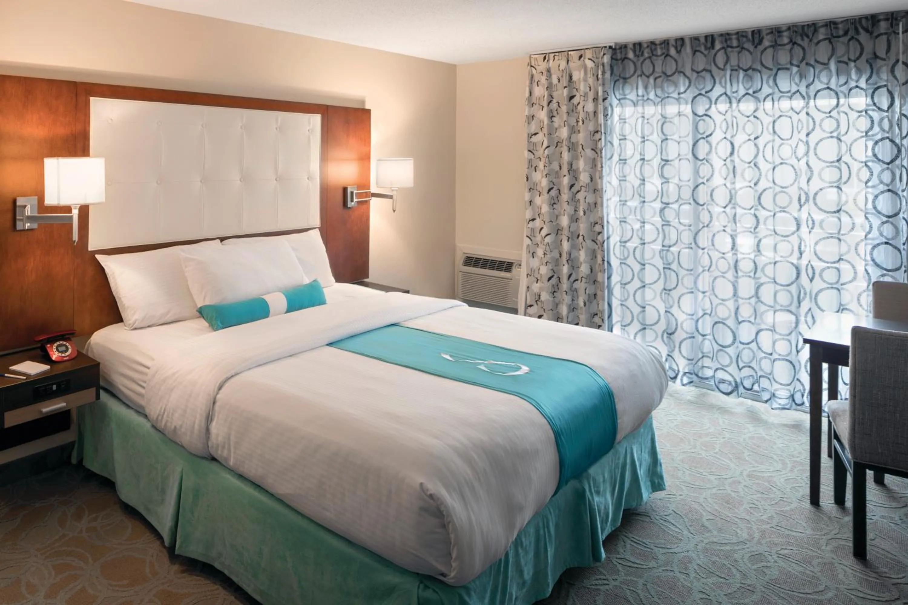 Bed in Aqua Blue Hotel