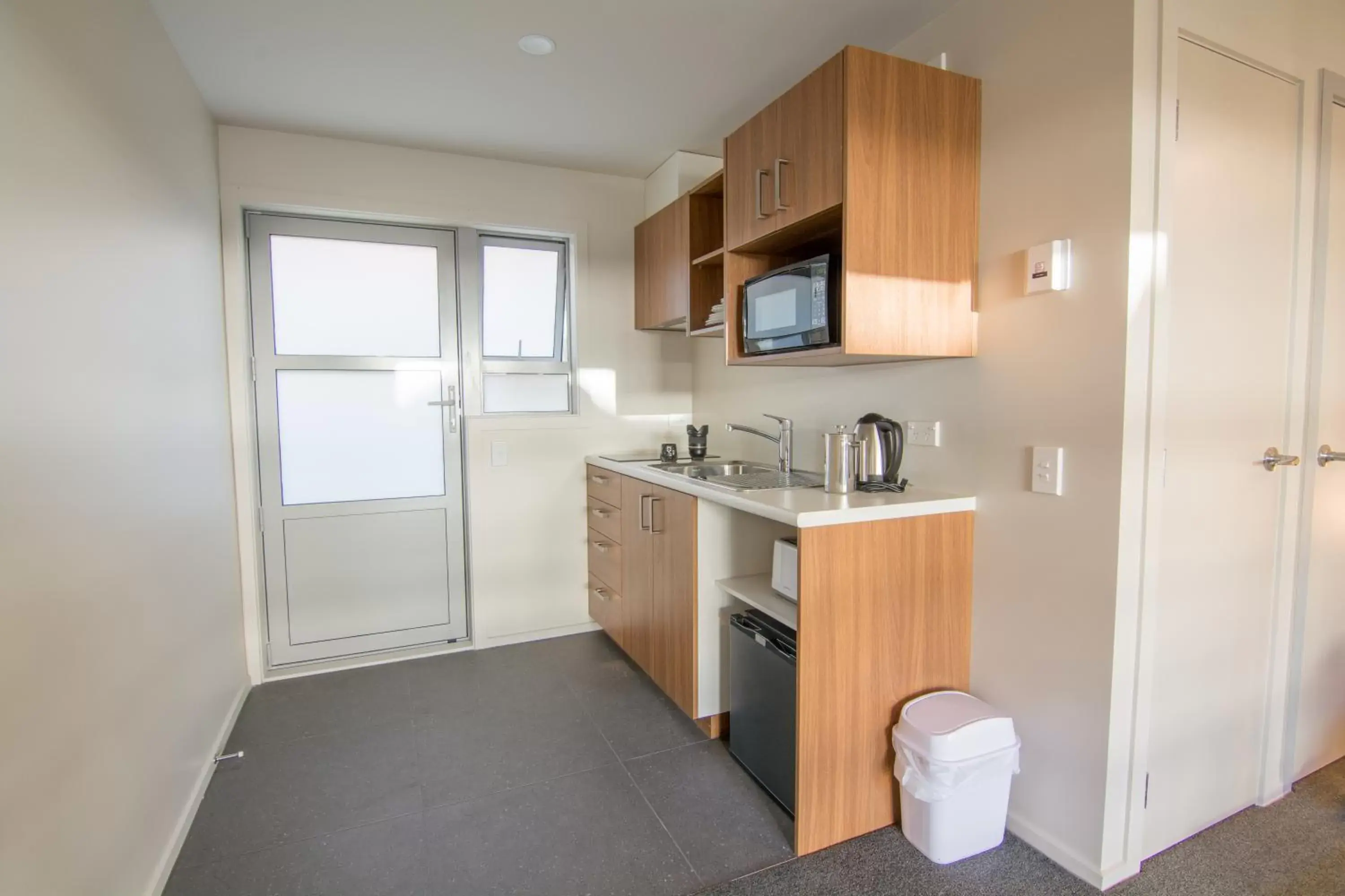 Kitchen or kitchenette, Kitchen/Kitchenette in 311 Motel Riccarton