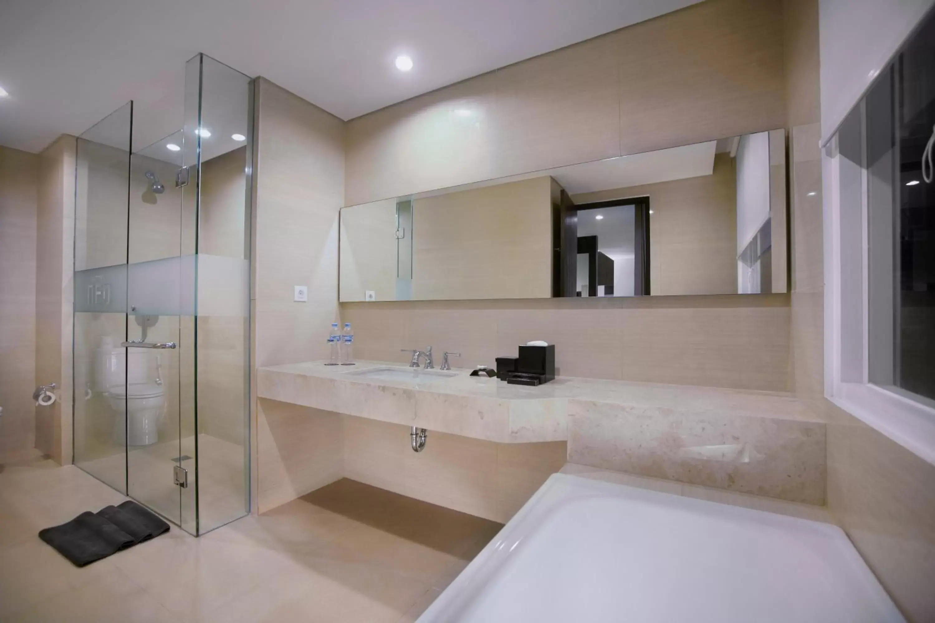 Bathroom in Neo Denpasar by ASTON