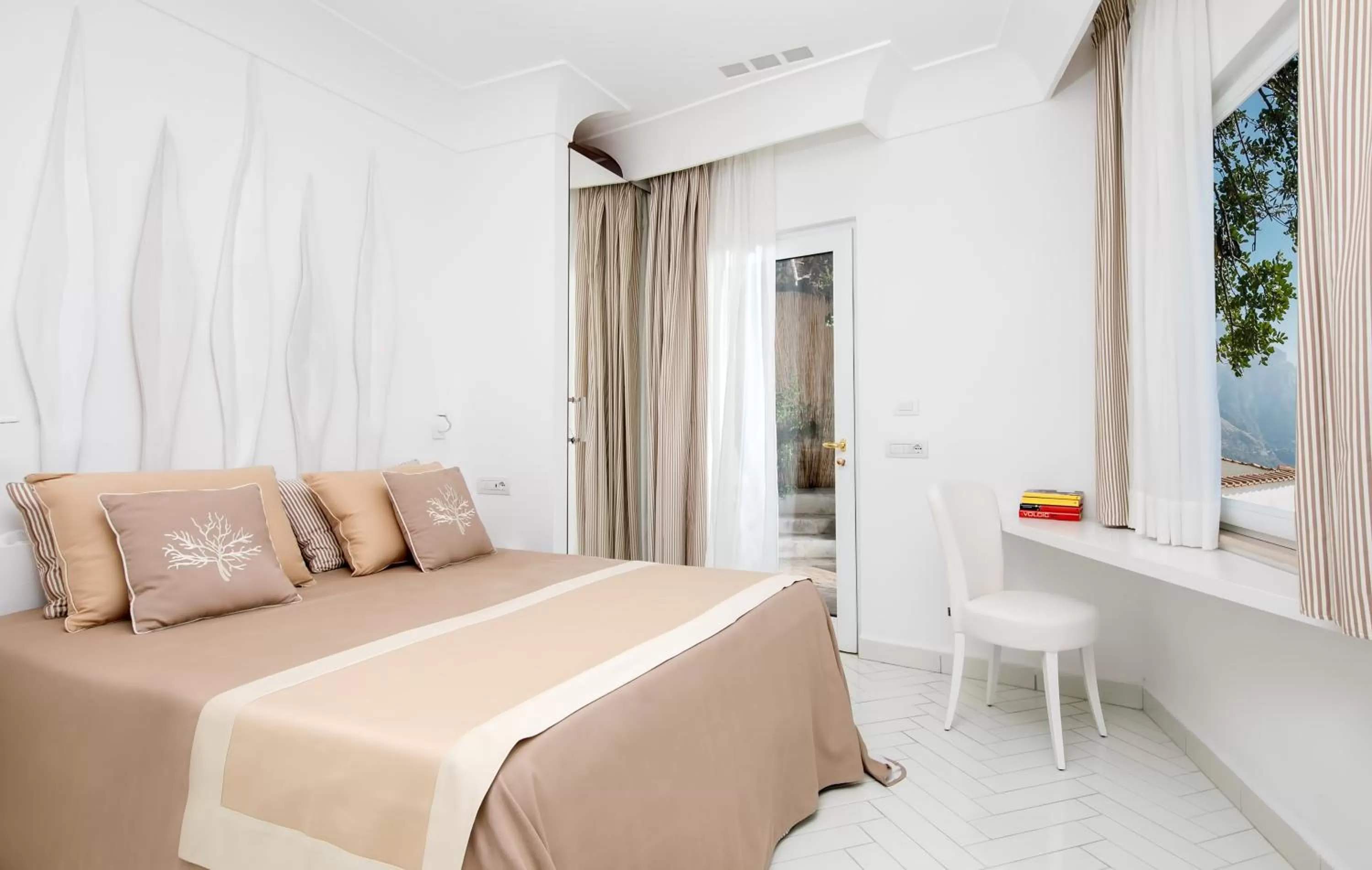 Bed in Hotel Le Agavi