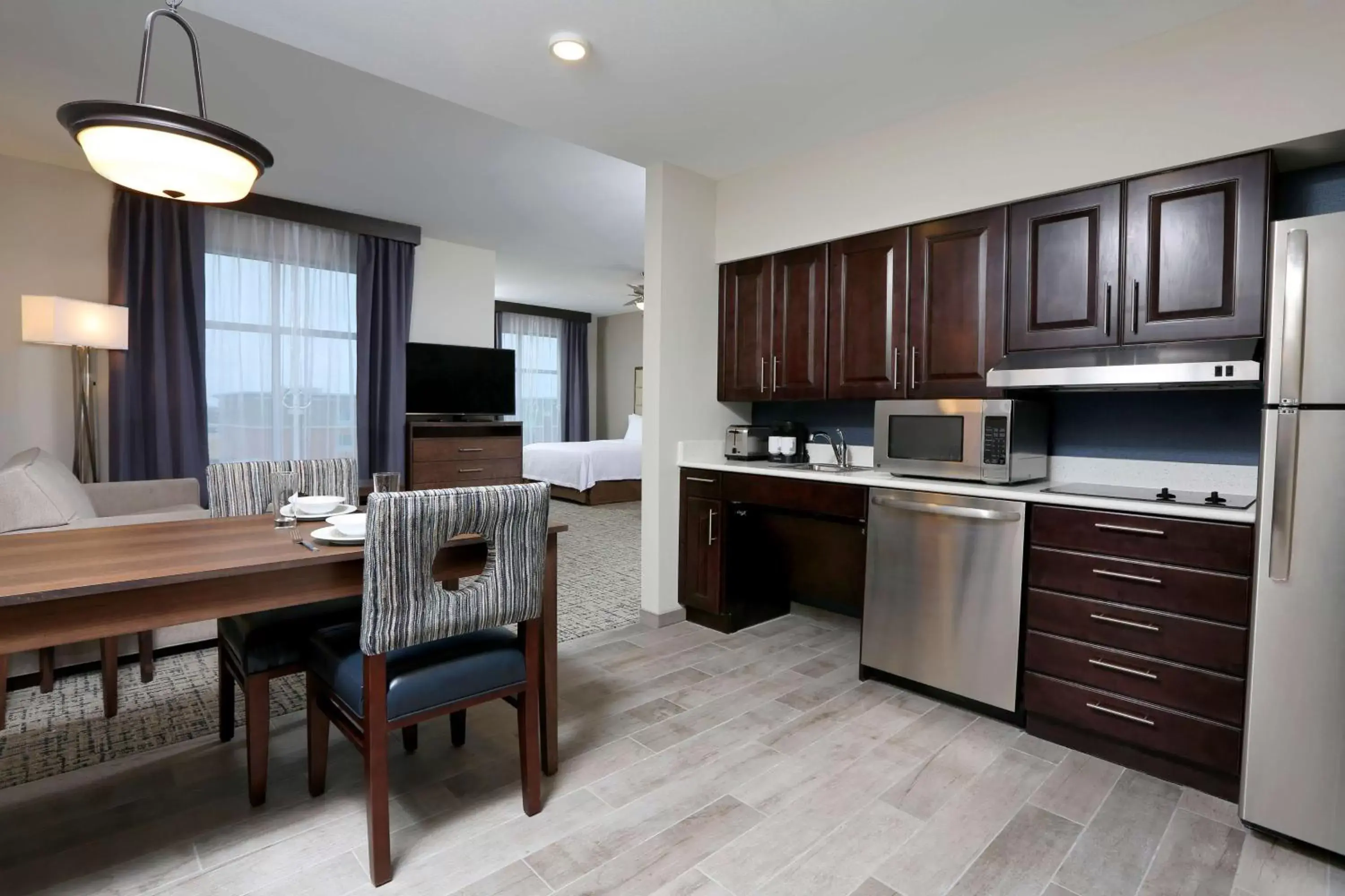 Bedroom, Kitchen/Kitchenette in Homewood Suites By Hilton West Fargo/Sanford Medical Center