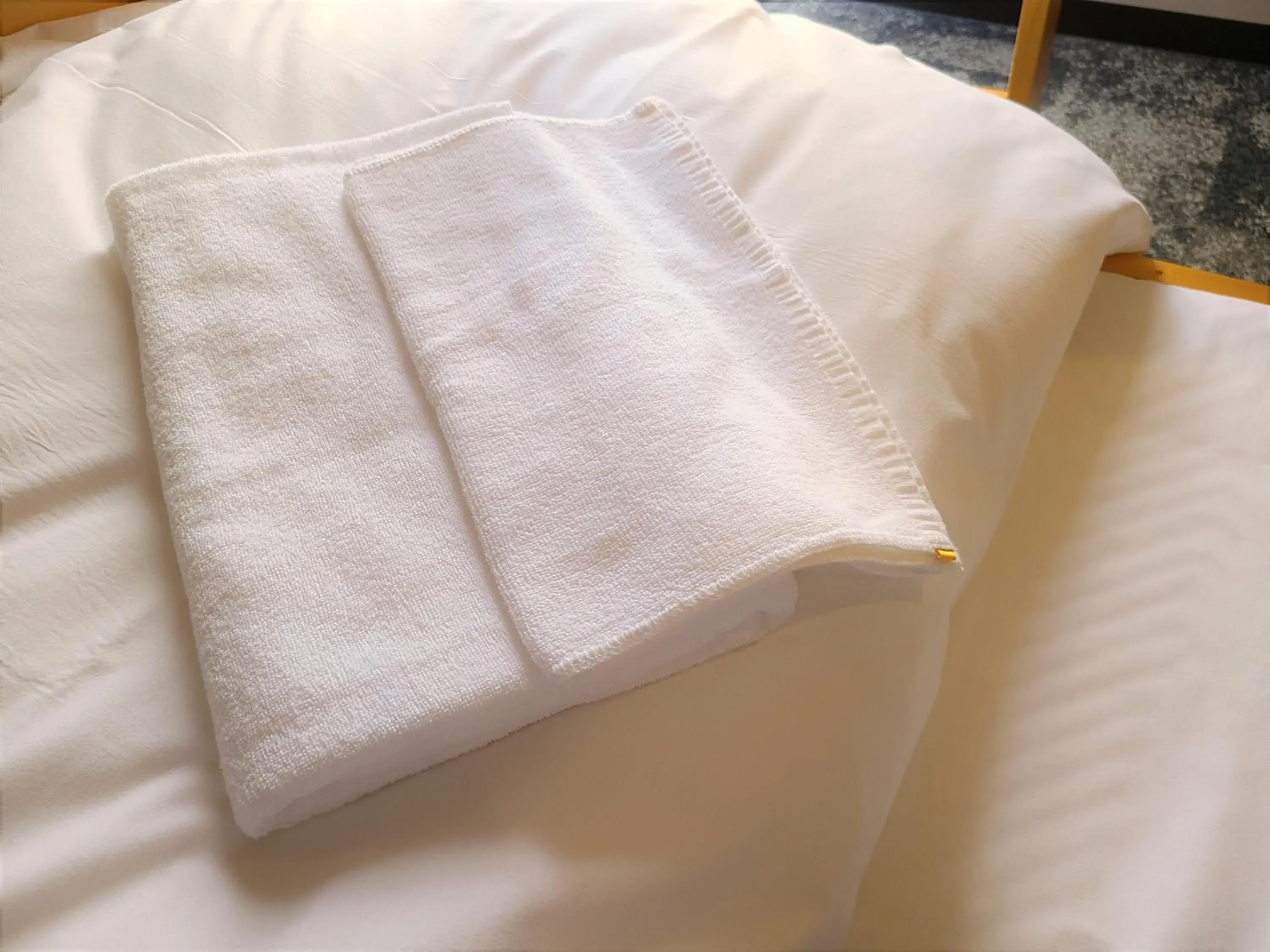 towels, Bed in Court Hotel Fukuoka Tenjin