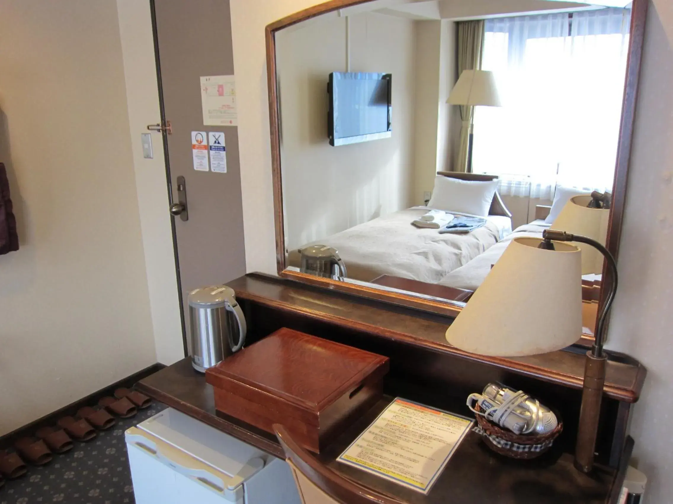 Photo of the whole room, Bed in Hotel New Station