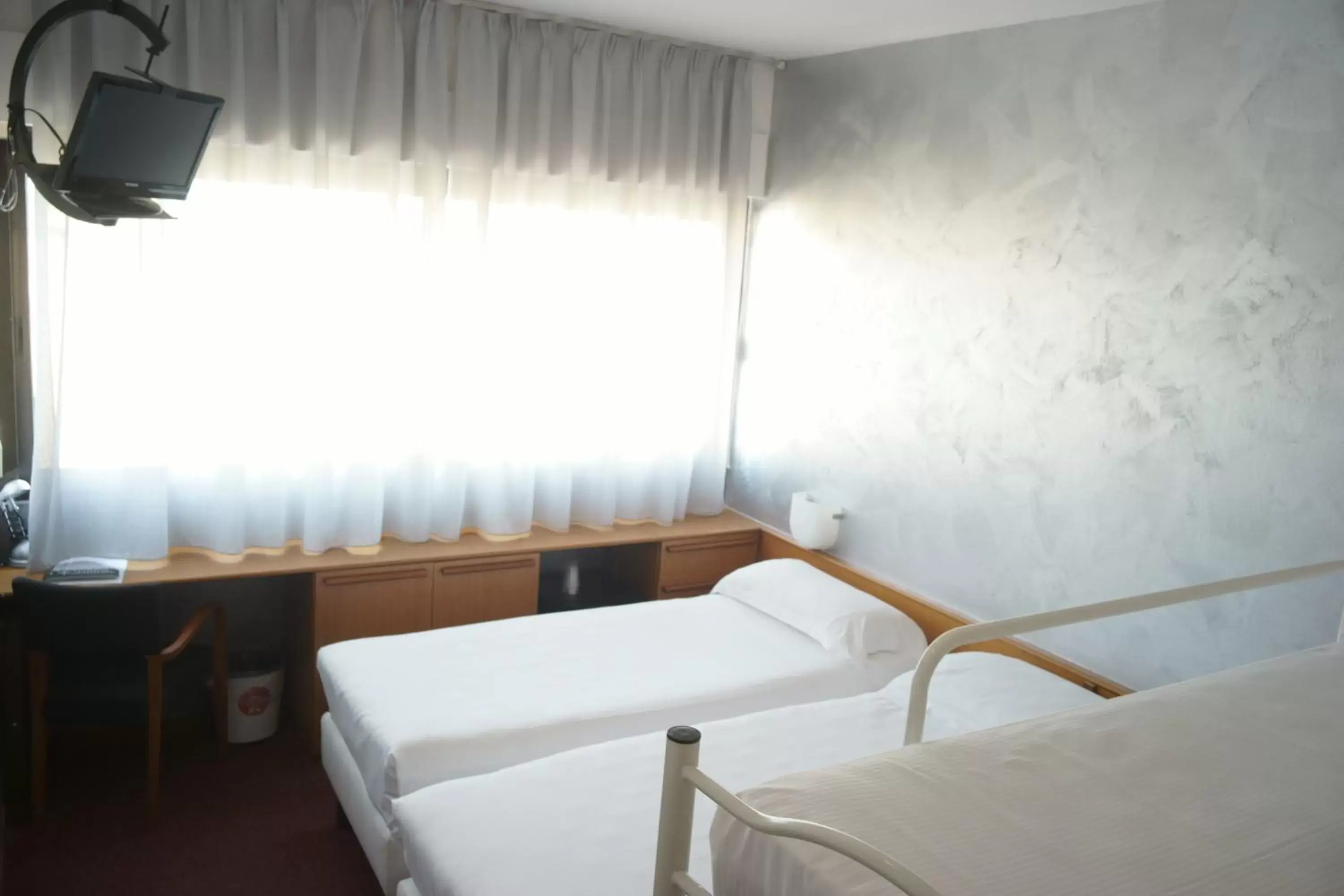 Bed in Hotel Valpolicella International