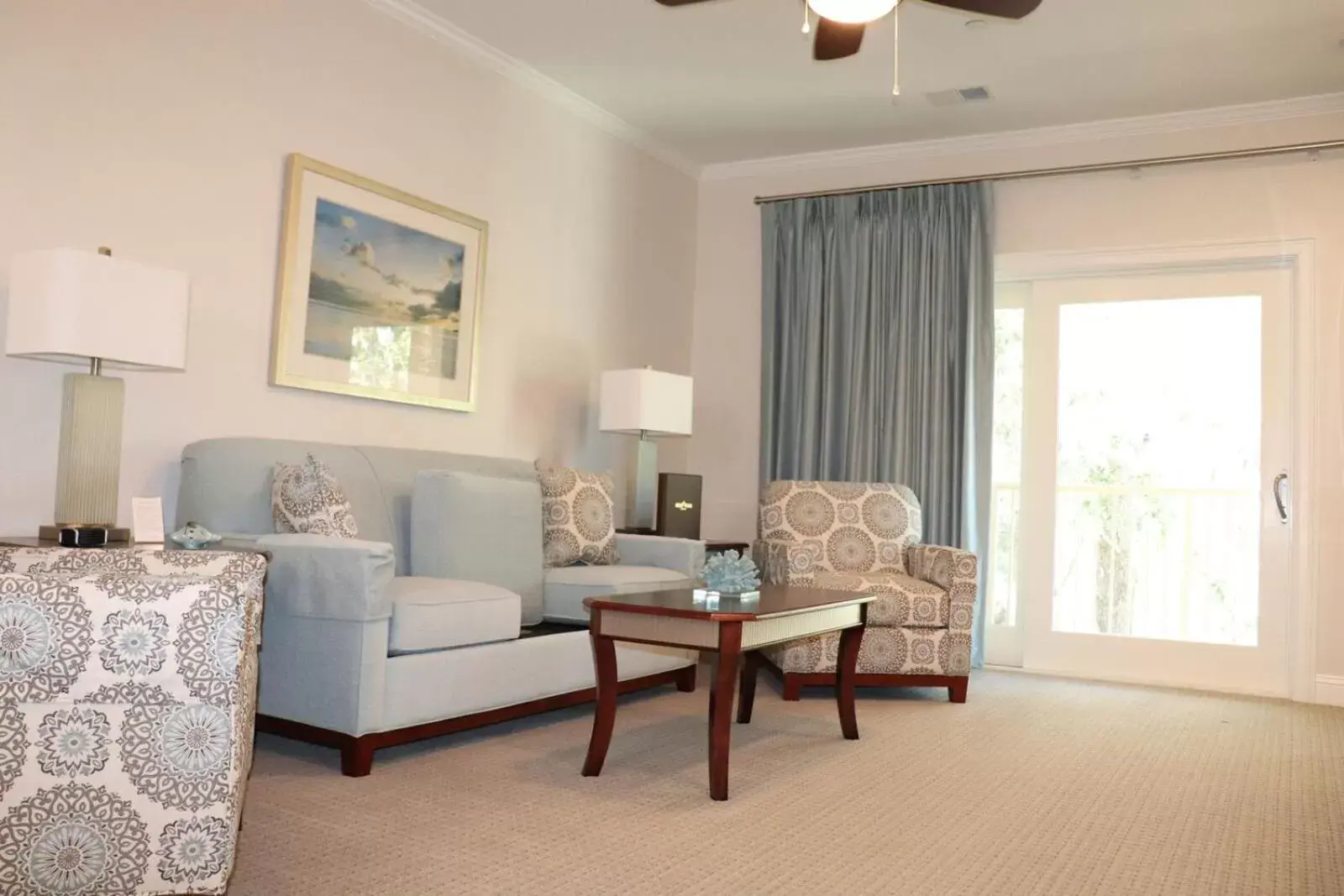 Bed, Seating Area in Coral Sands Resort by Palmera