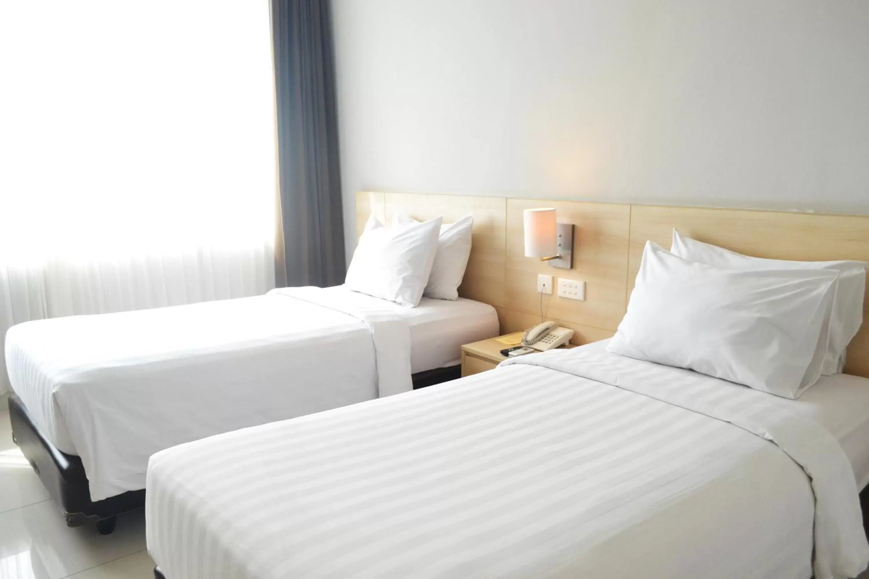 Deluxe Double or Twin Room in Grand Cakra Hotel Malang Deluxe Double or Twin Room in Grand Cakra Hotel Malang