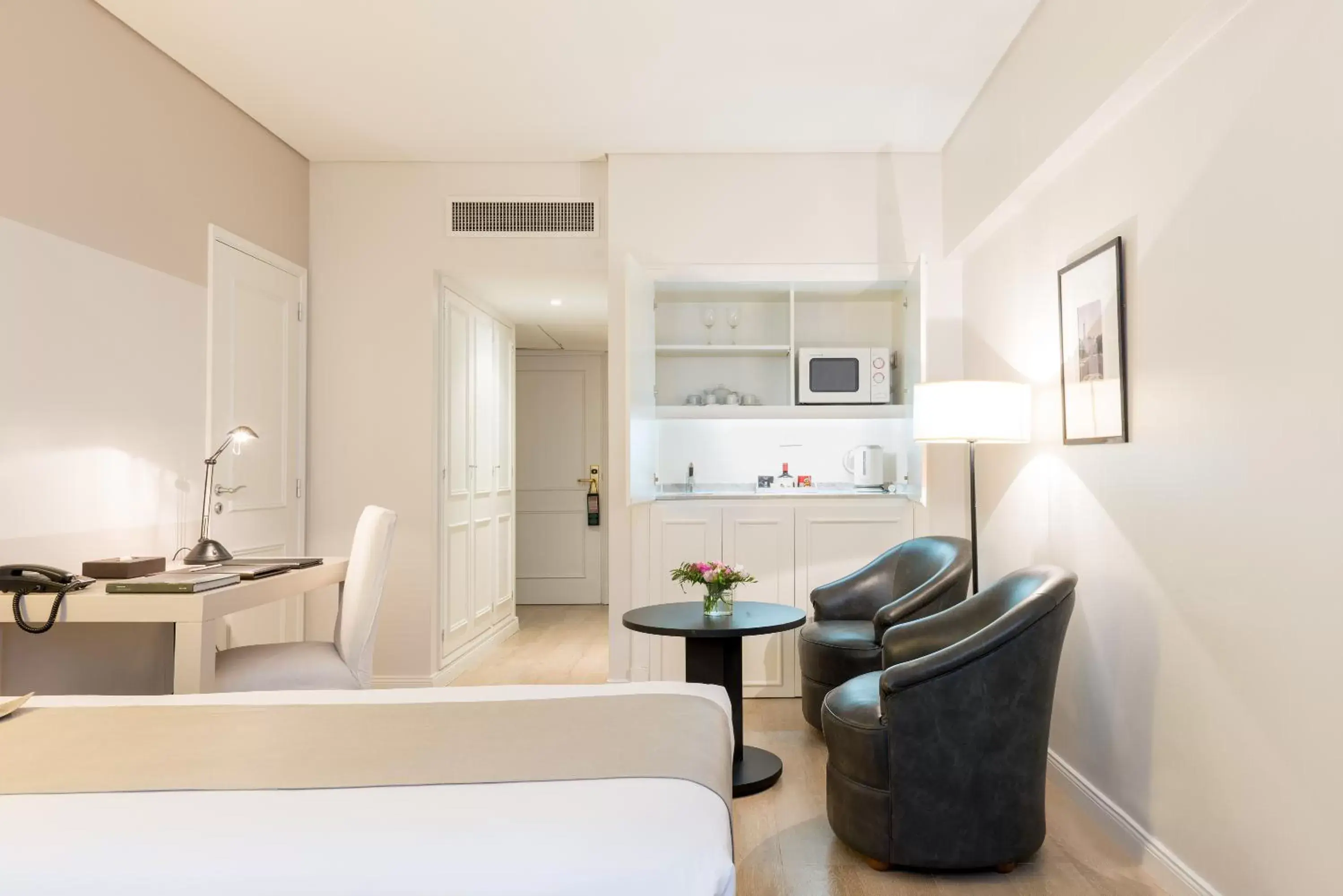 Bedroom, Seating Area in Loi Suites Recoleta Hotel