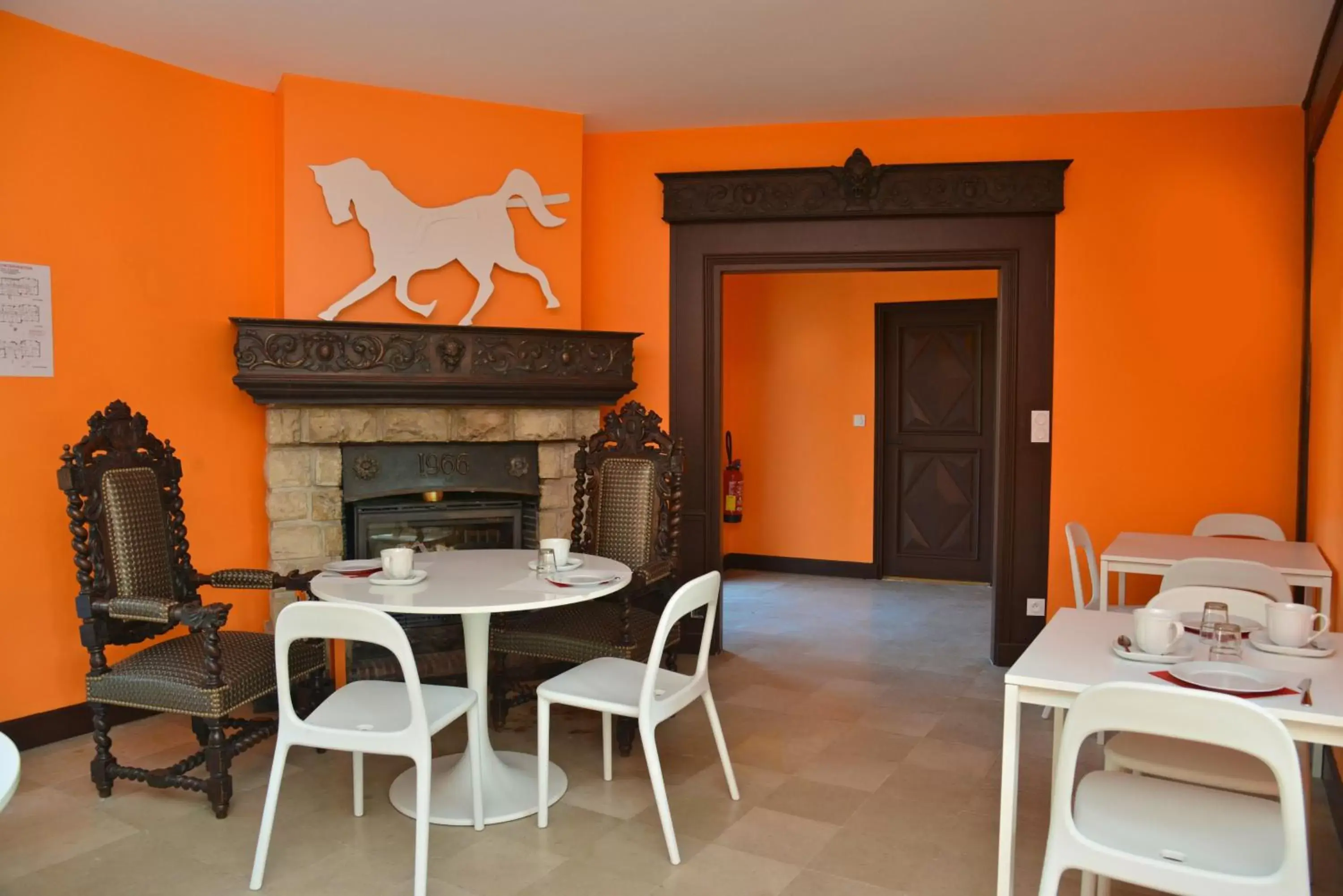 Communal lounge/ TV room, Dining Area in Logis - Hotel Restaurant La Mire