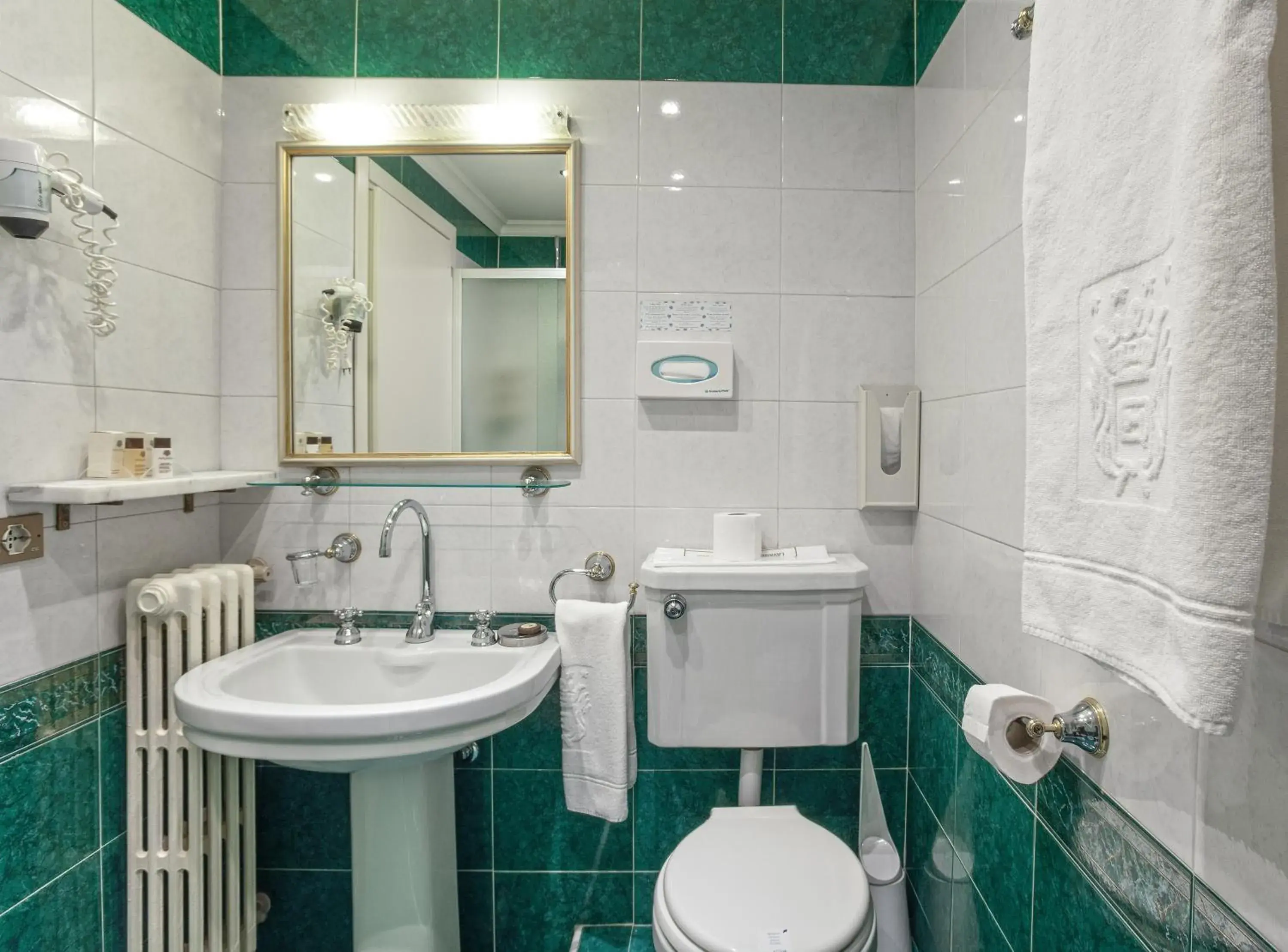 Bathroom in Hotel Quisisana Terme Bathroom in Hotel Quisisana Terme