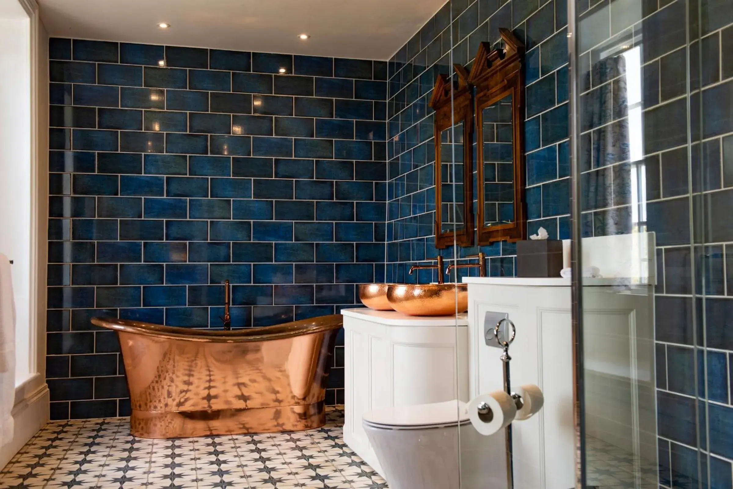 Bathroom in The Haycock Manor Hotel