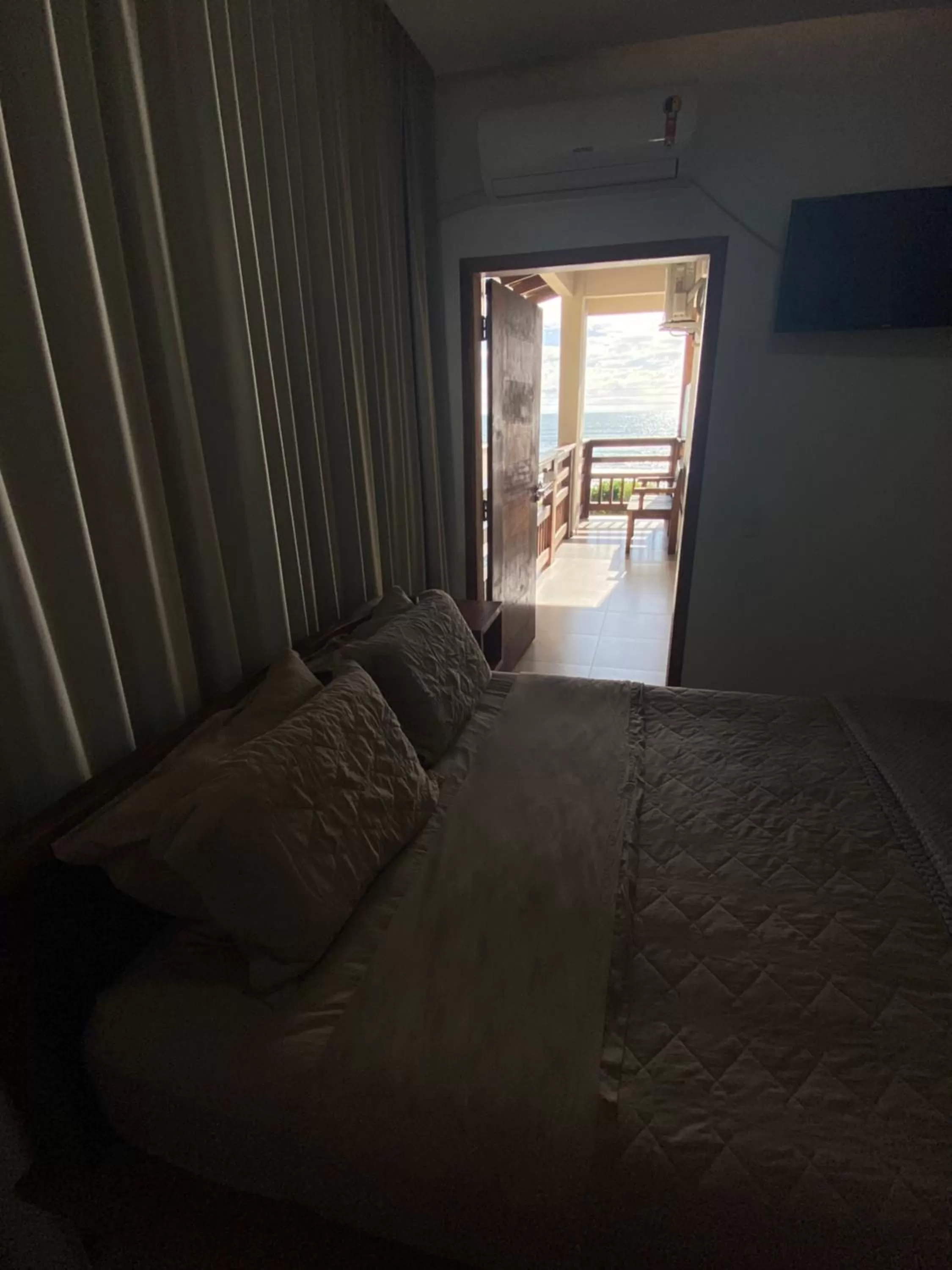 Bed in Pousada Casa Albatross