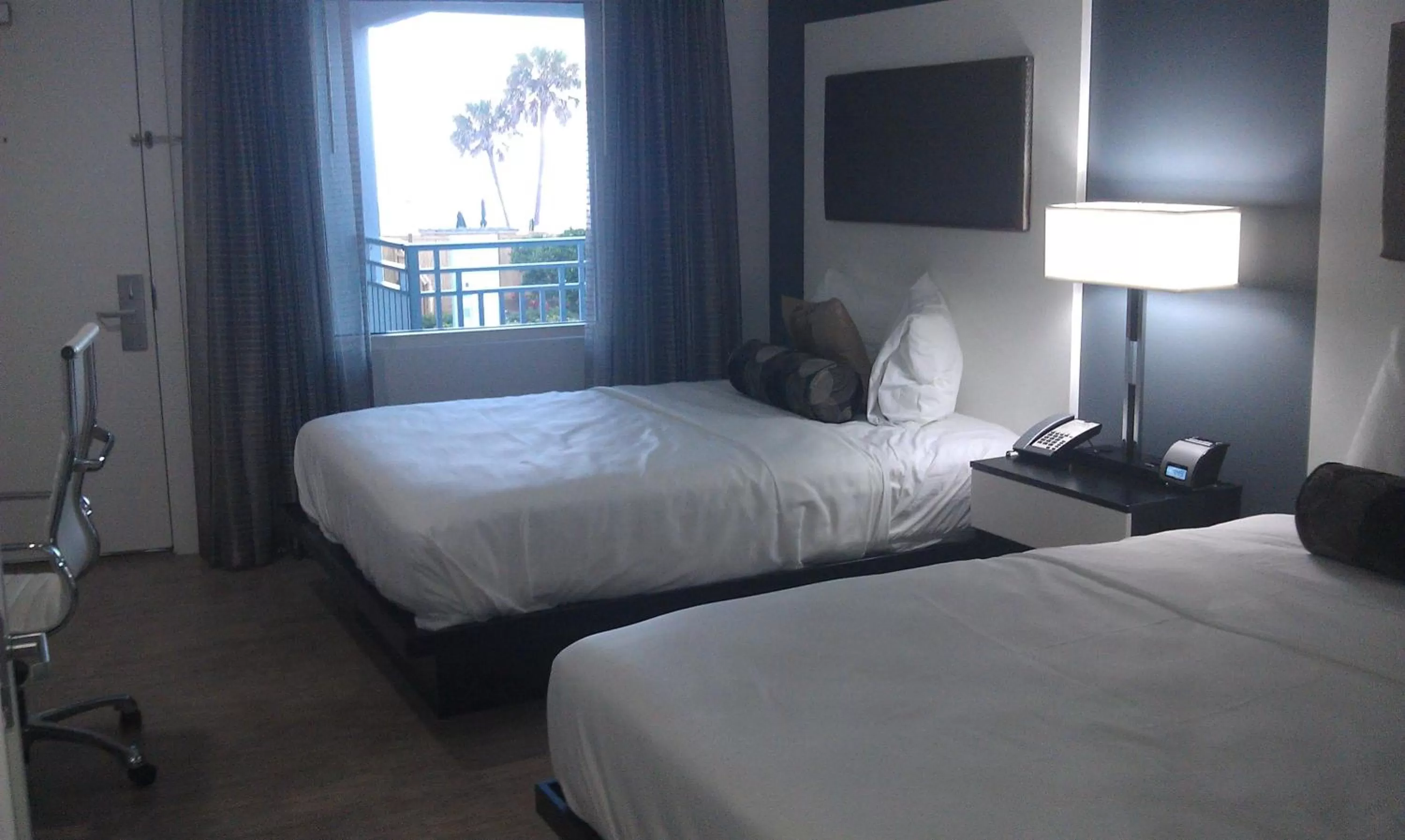 Bed in Lotus Boutique Inn and Suites