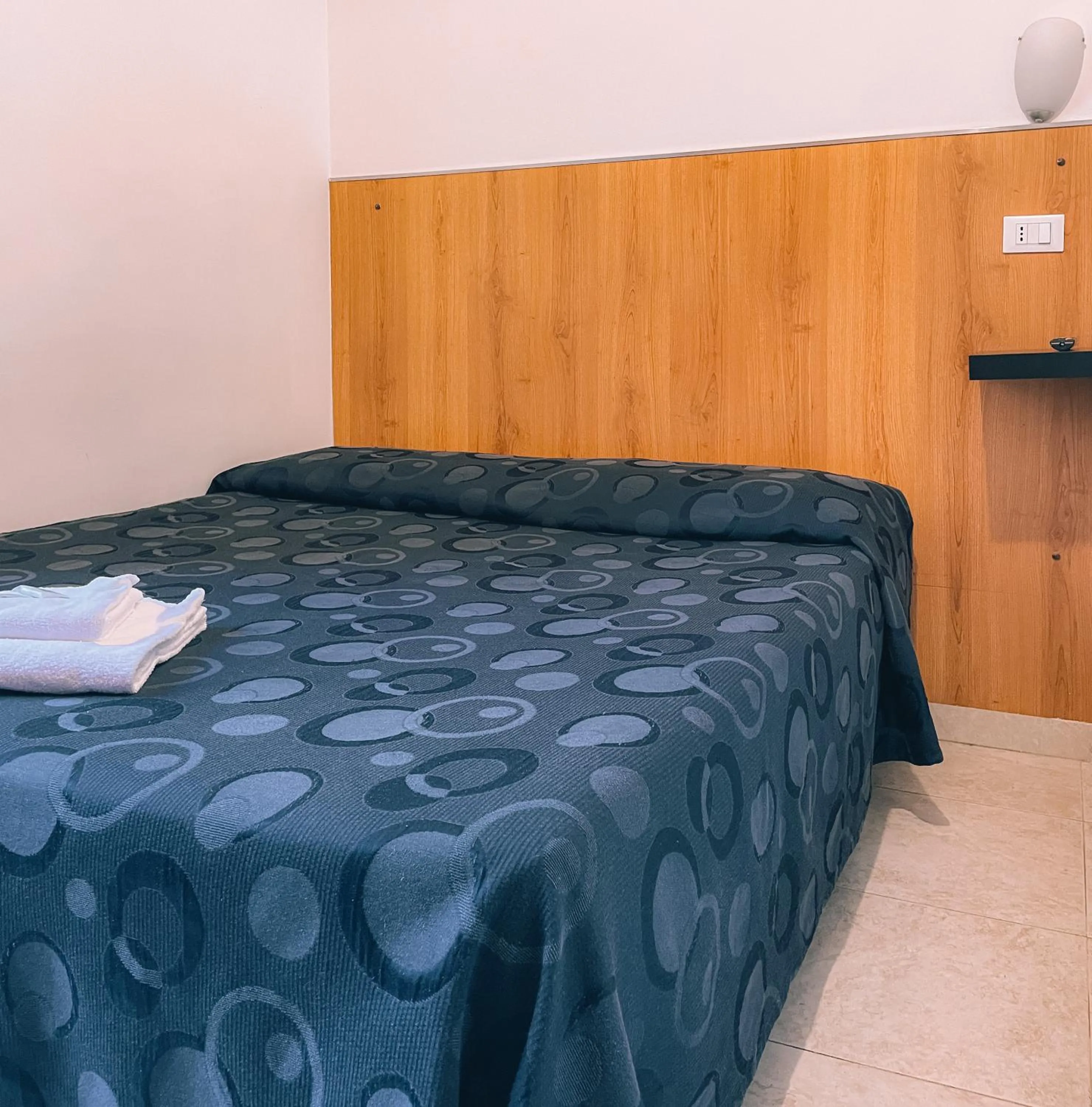 Bed in Hotel Fiorenza