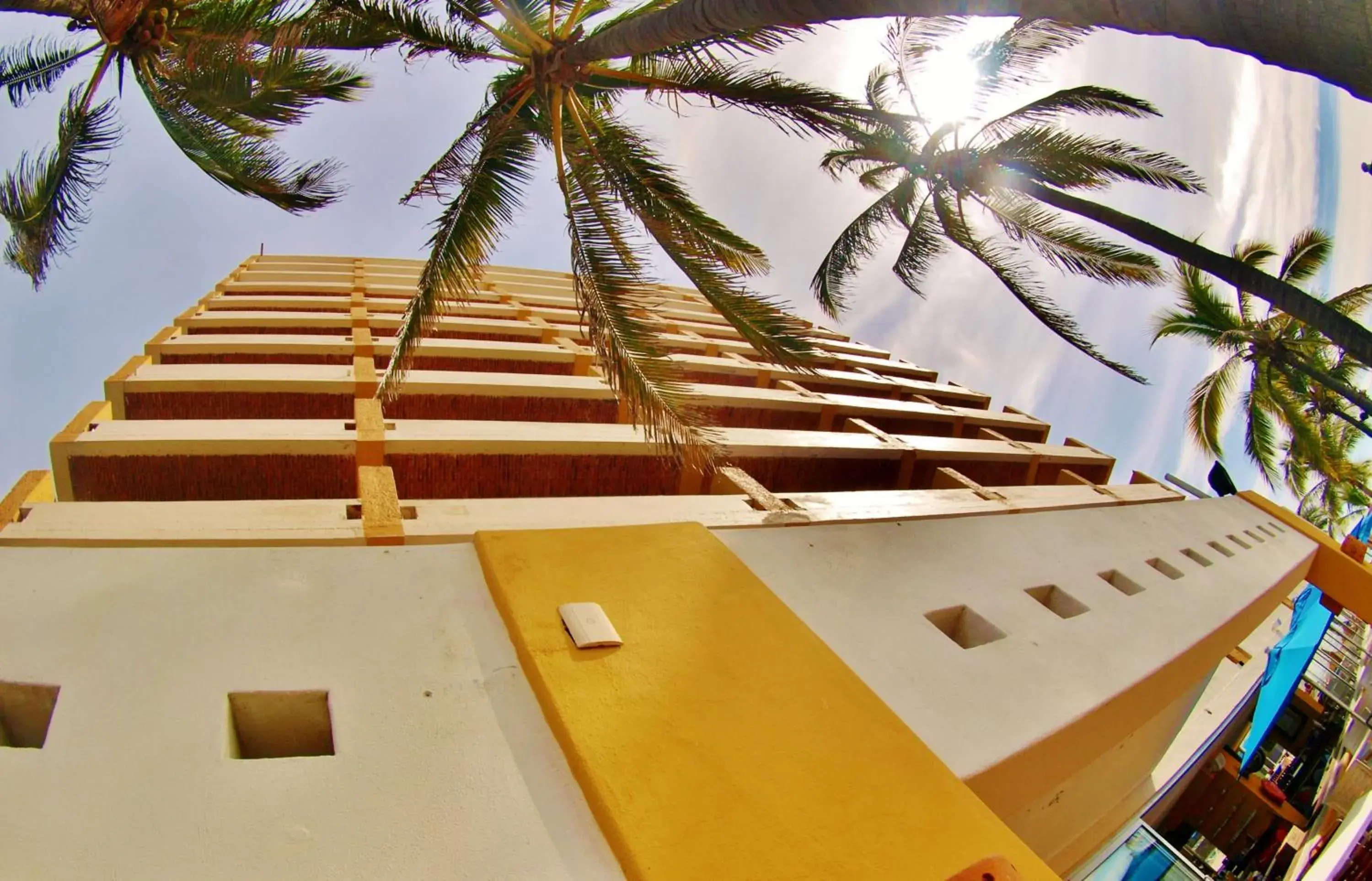 Property building in Las Flores Beach Resort Property building in Las Flores Beach Resort