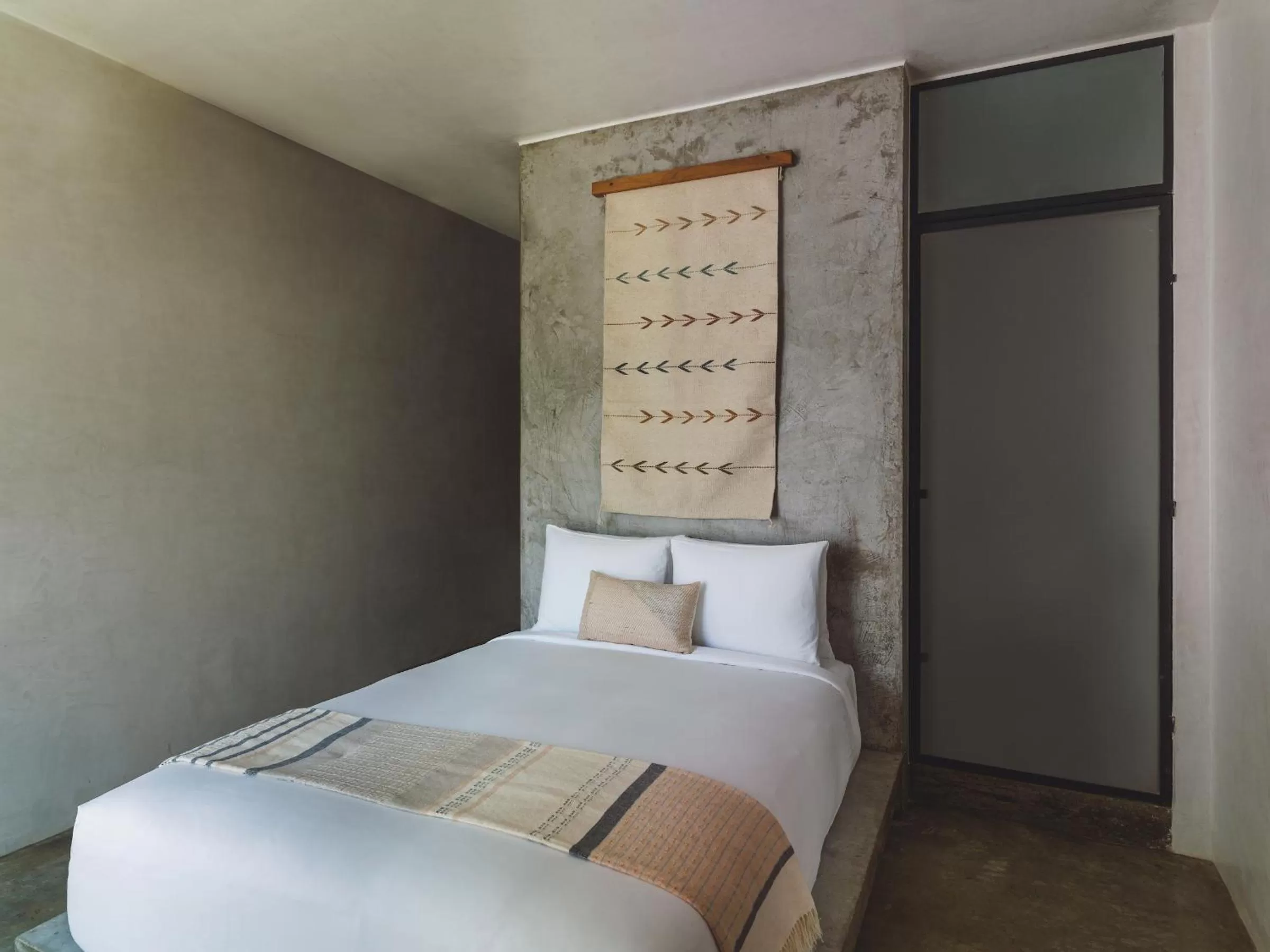 Bed in Drift San Jose del Cabo, a Member of Design Hotels