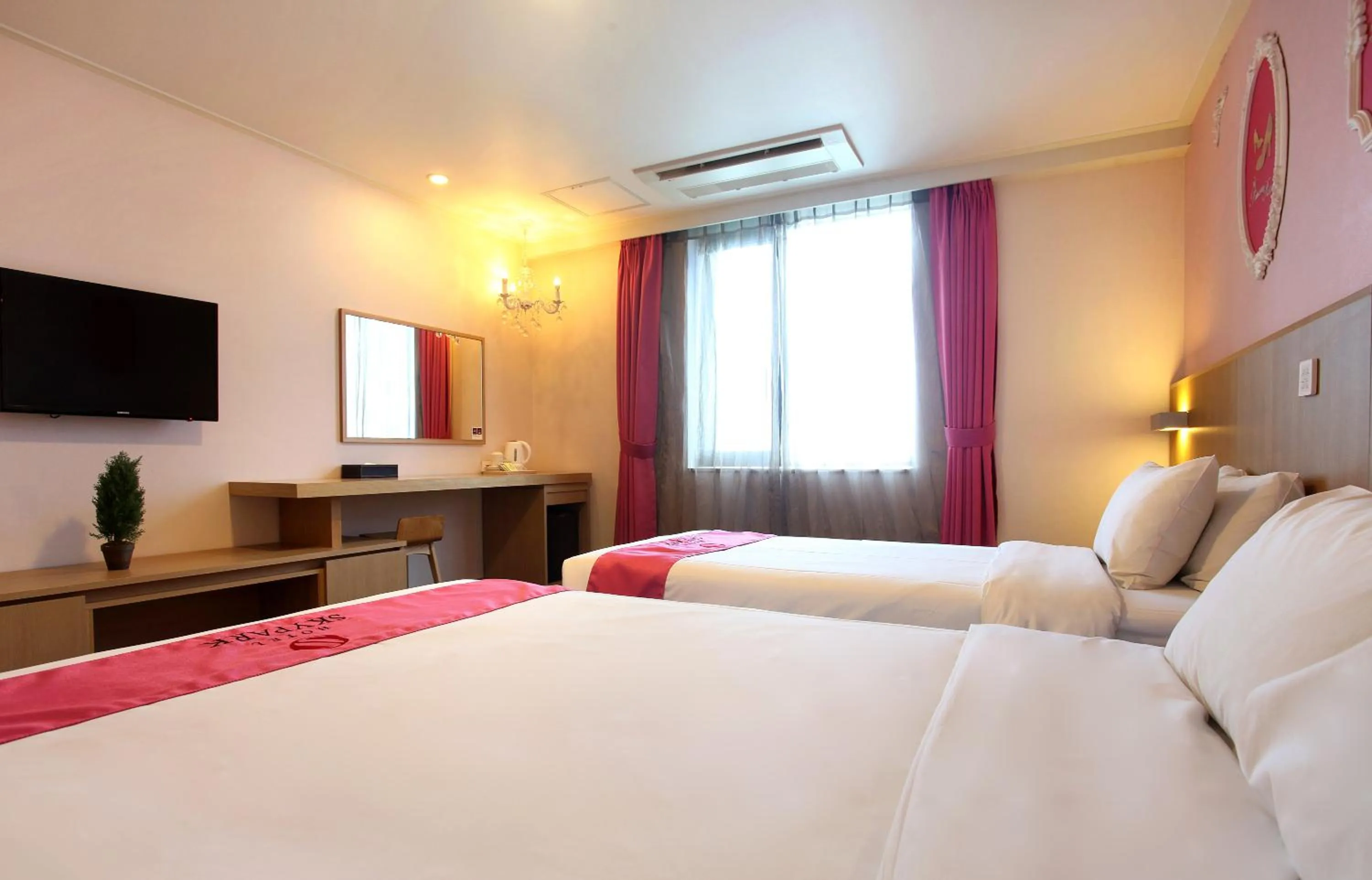 Bedroom, Bed in Hotel Skypark Jeju 1 Newly renovated