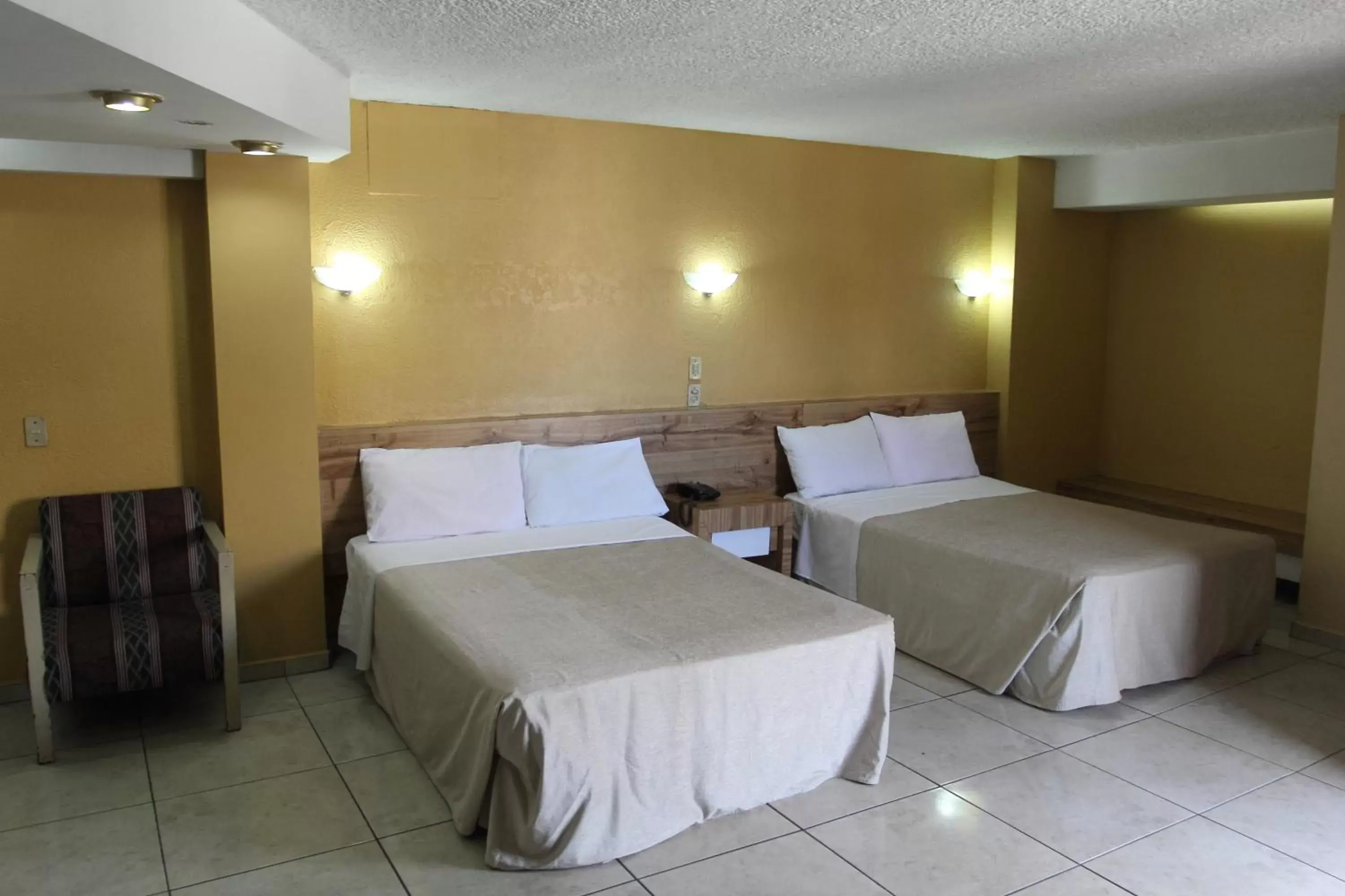 Bed in Hotel Universo Bed in Hotel Universo