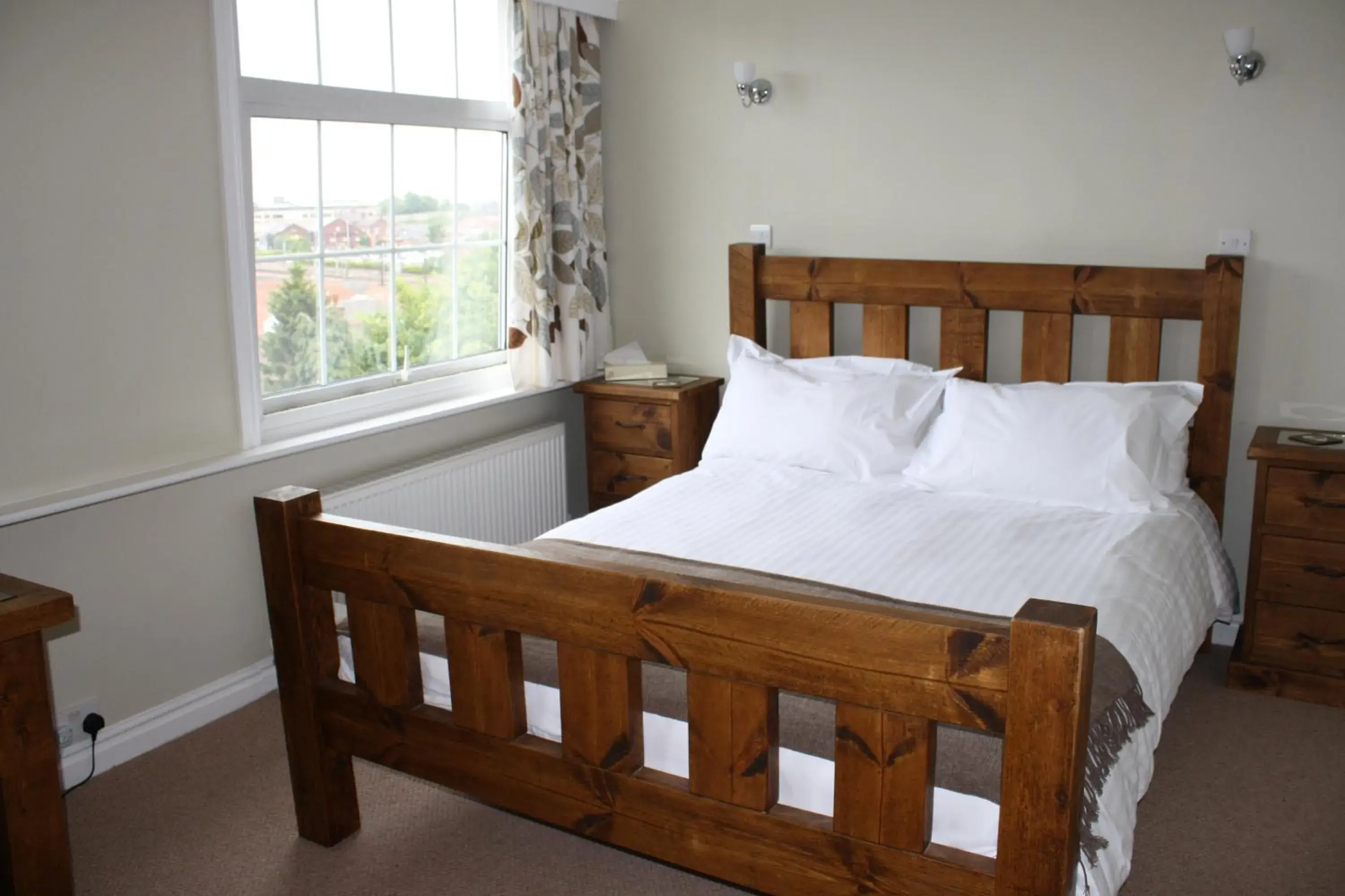 Bed in Holmwood House Guest Accommodation