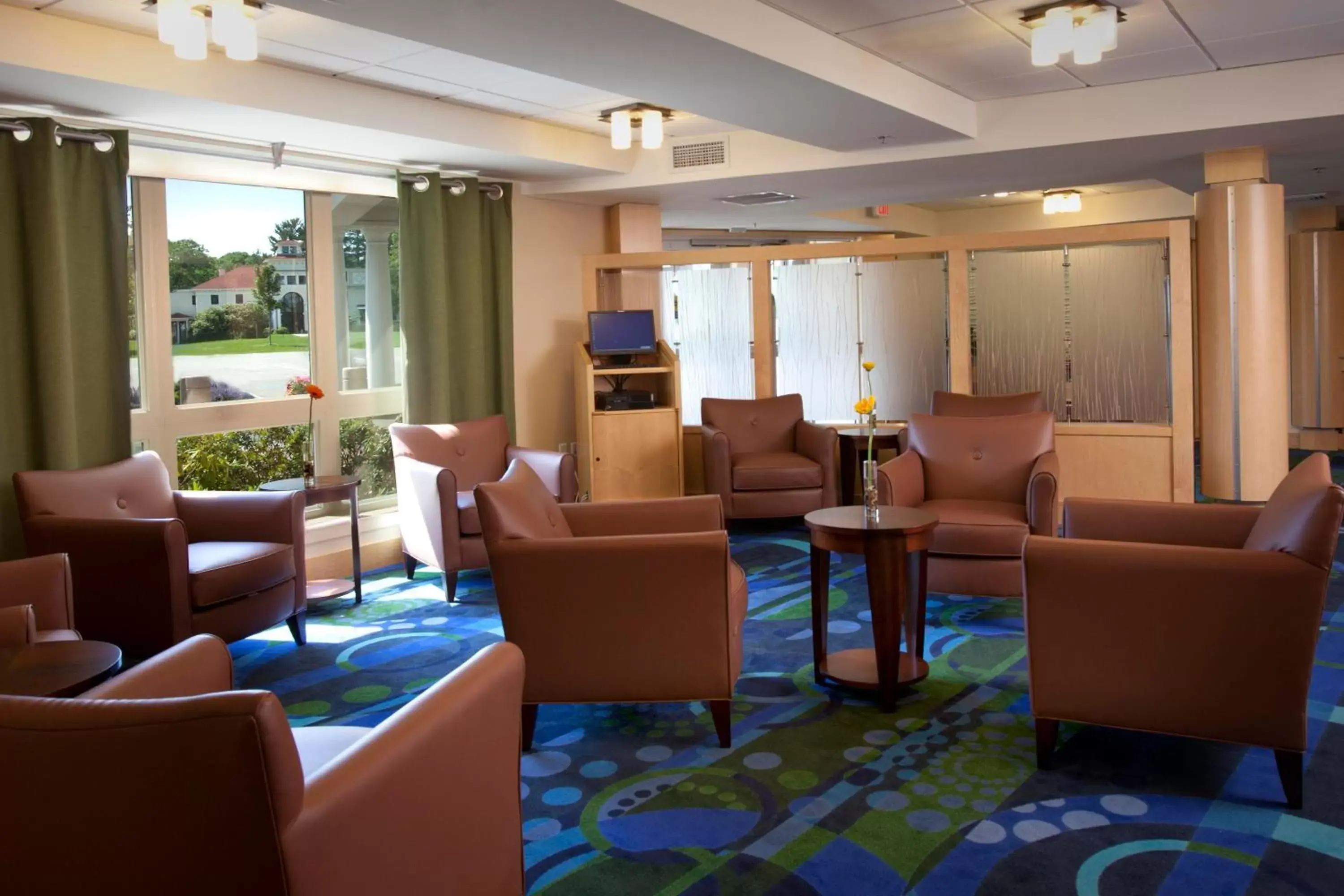 Communal lounge/ TV room in The Wylie Inn and Conference Center at Endicott College