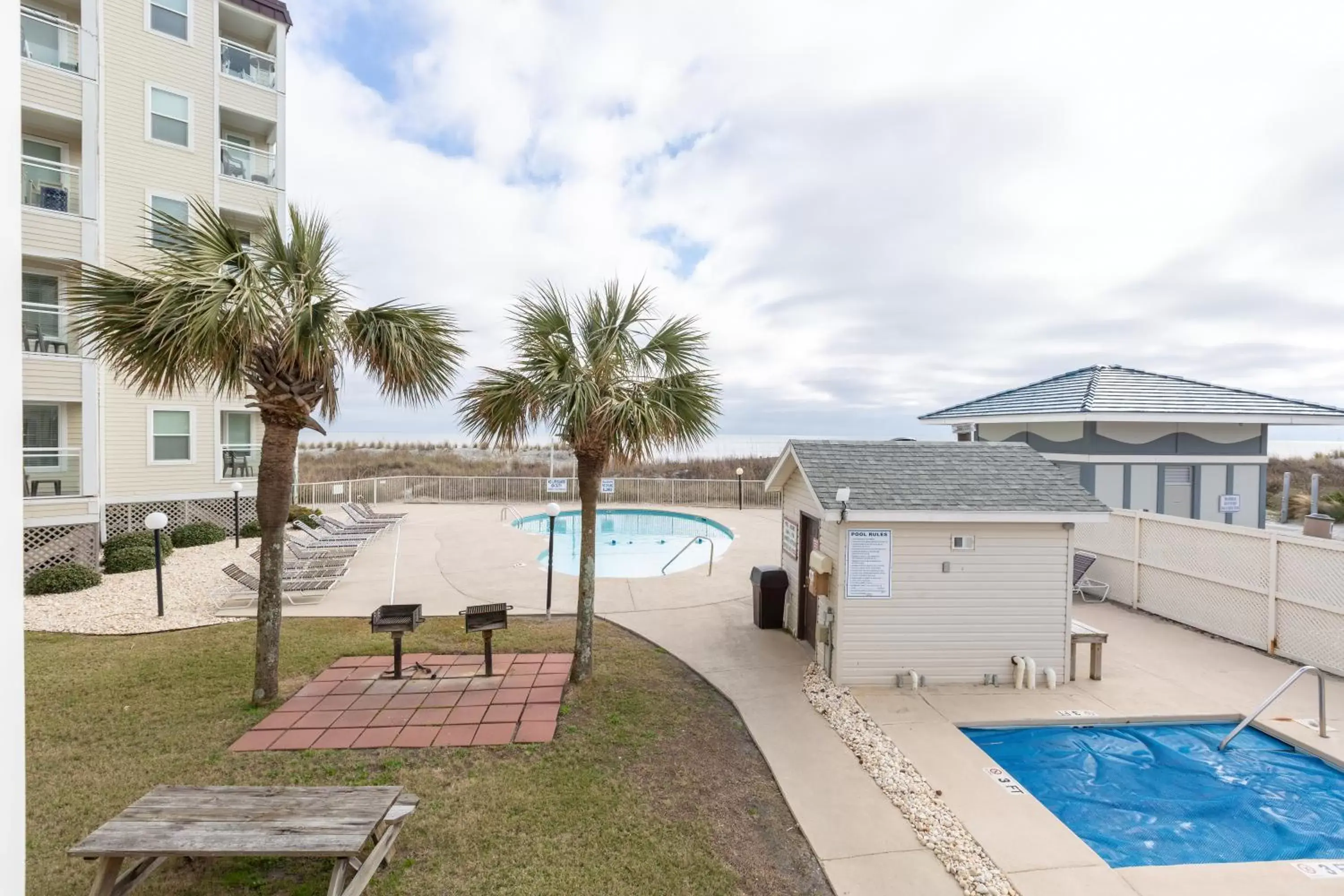 Swimming Pool in A Place at the Beach by Capital Vacations