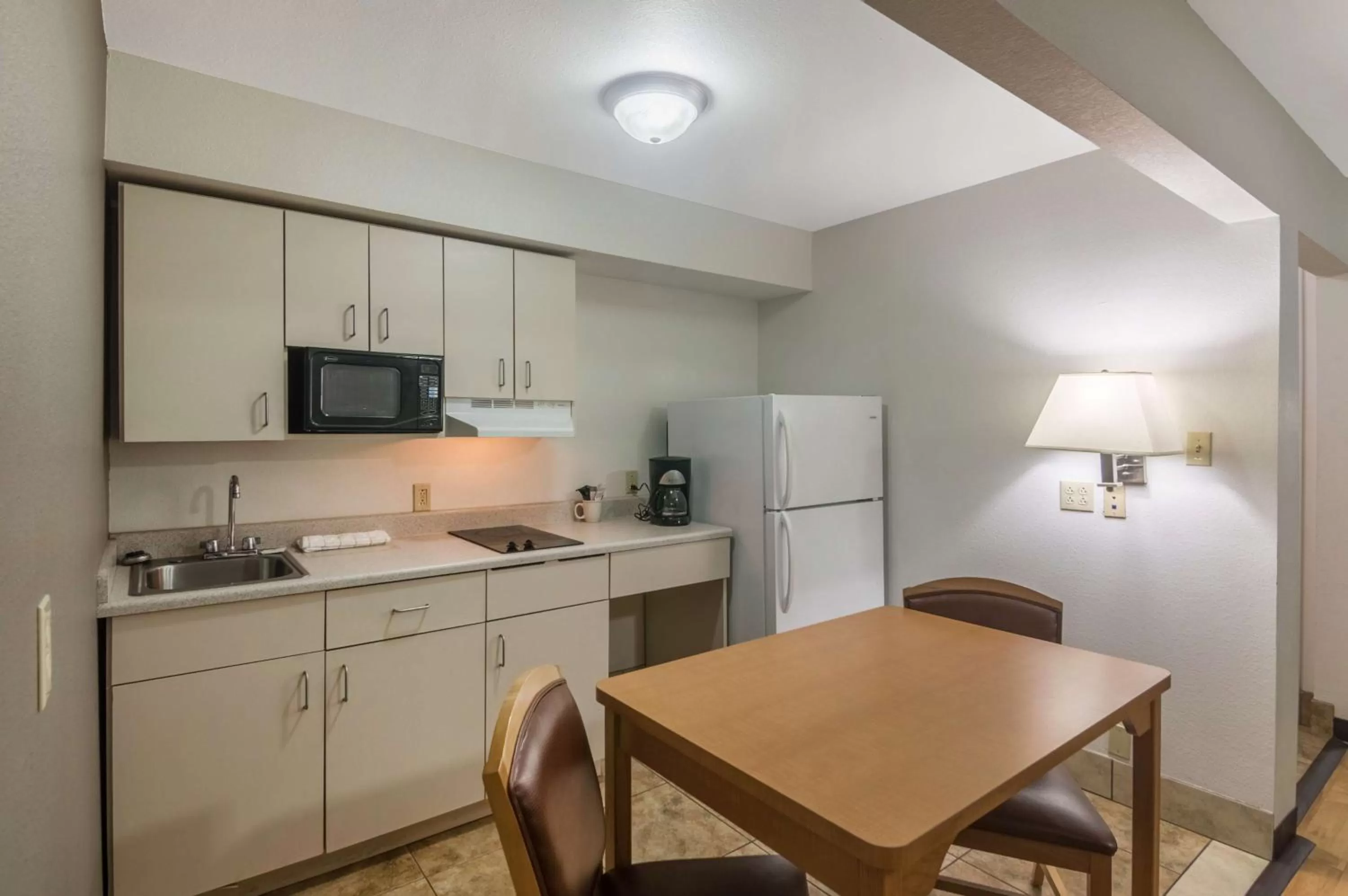 Kitchen or kitchenette in Blue Bonnet Suites -Lubbock, TX - Medical Center