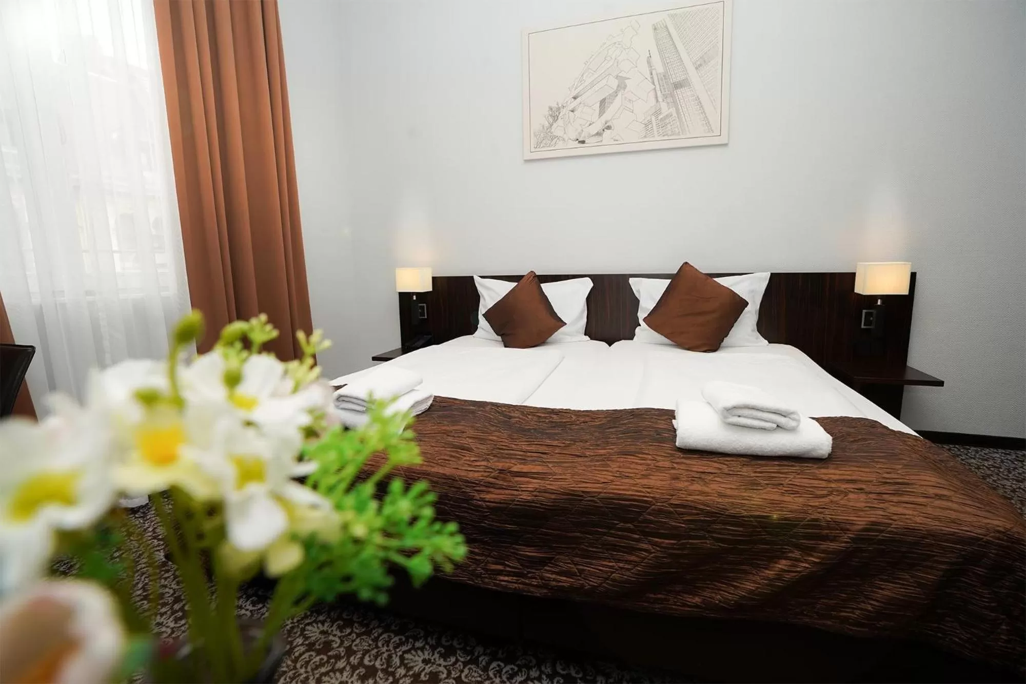 Bed in The Atrium Hotel