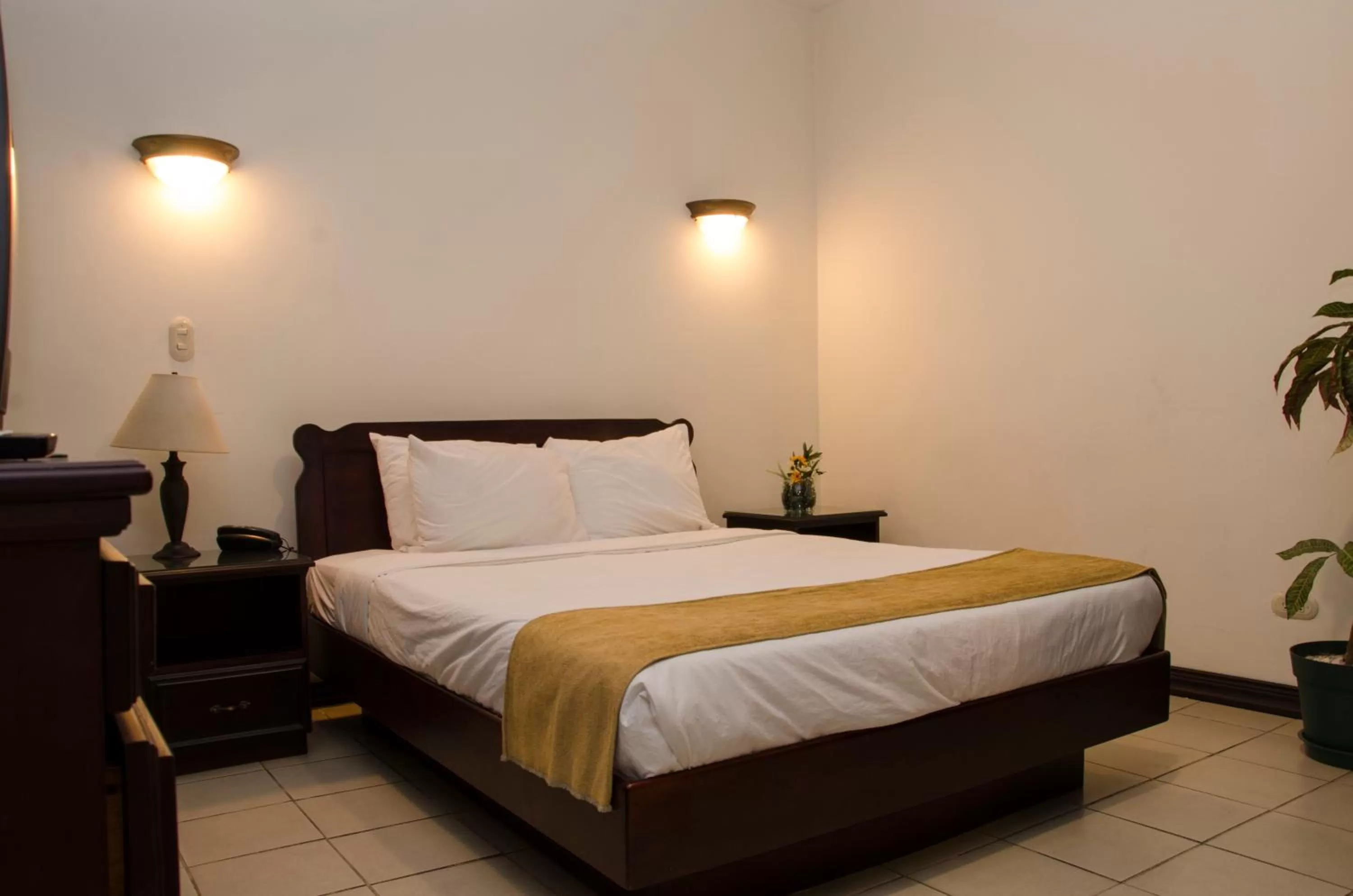 Bedroom, Bed in Hotel Plaza Real Suites & Apartments San Jose